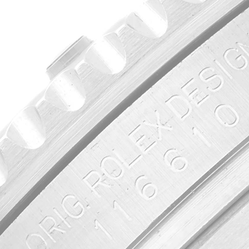 This close-up image shows the side view of the Rolex Submariner 116610LV Men
s Stainless Steel Green Dial 116610LV Men
s Stainless Steel Green Dial
s bezel and case, featuring the model number and "Rolex" engraving.