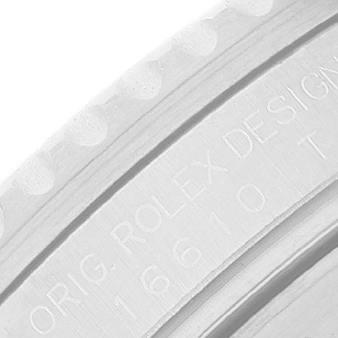 This image focuses on the engraving on the case side of a Rolex Submariner 16610LV Men
s Stainless Steel Black Dial 16610LV Men
s Stainless Steel Black Dial watch.