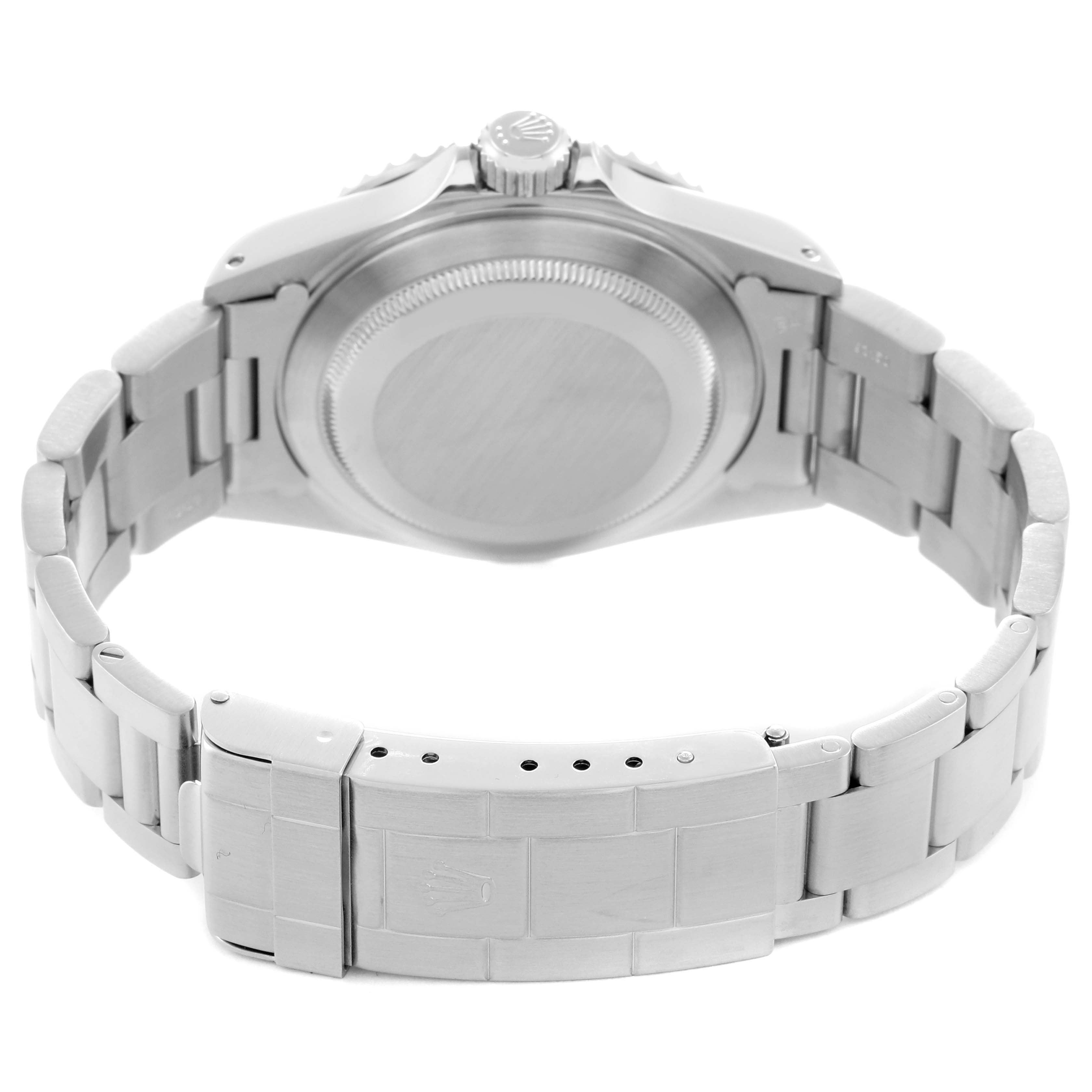 The image shows the back view of a Rolex Submariner, model 14060, focusing on the case back, bracelet, and clasp.