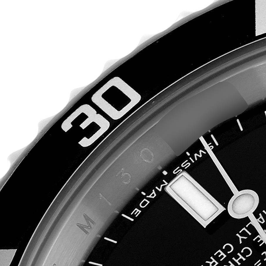 The image shows a close-up angle of the Rolex Submariner, model number 14060, focusing on the bezel with the "30" marking and part of the dial.