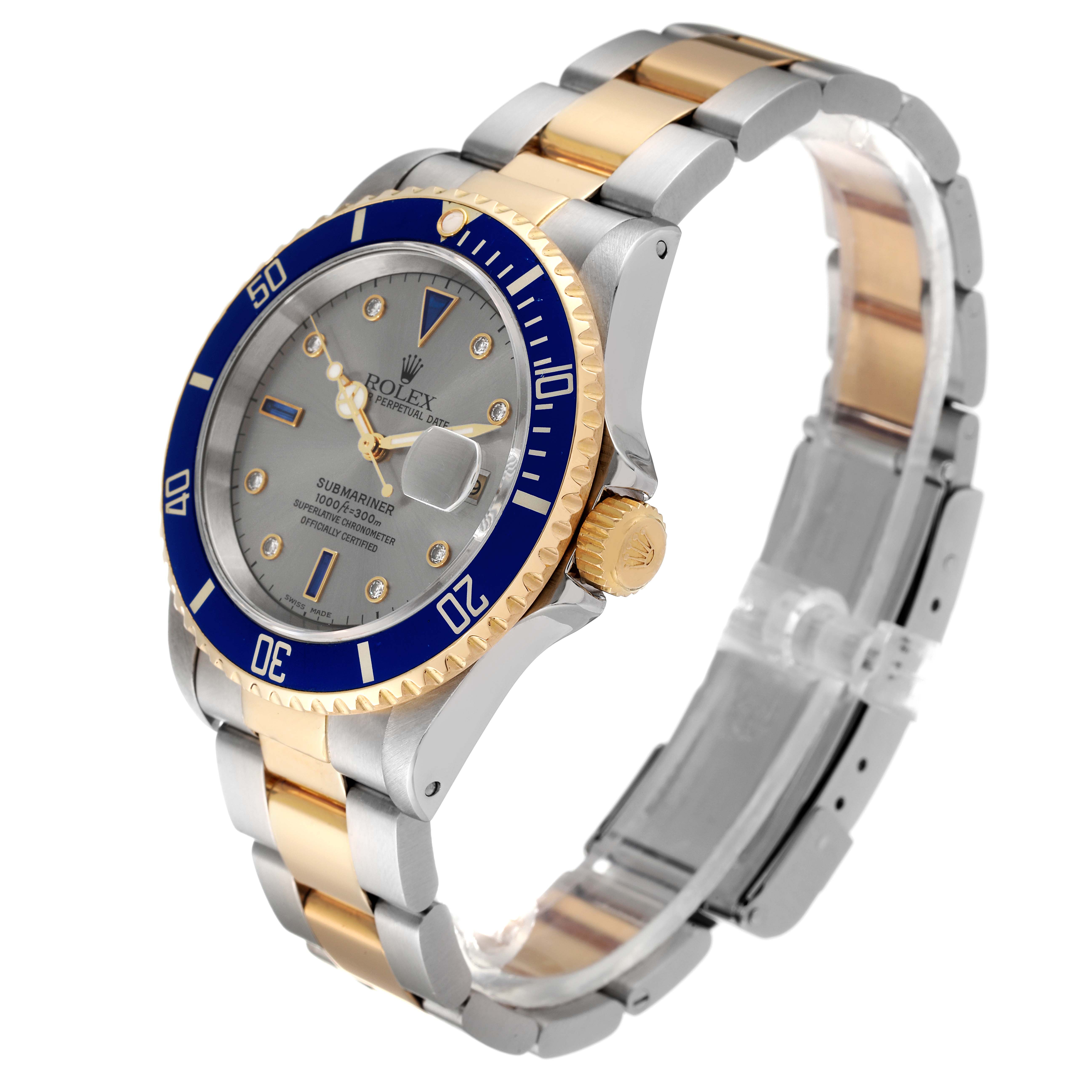 This image shows a Rolex Submariner 16613 Men's Steel and Gold (two tone) Grey Dial 16613 Men's Steel and Gold (two tone) Grey Dial watch at a three-quarter angle, highlighting its blue bezel, gold and silver bracelet, and crown.