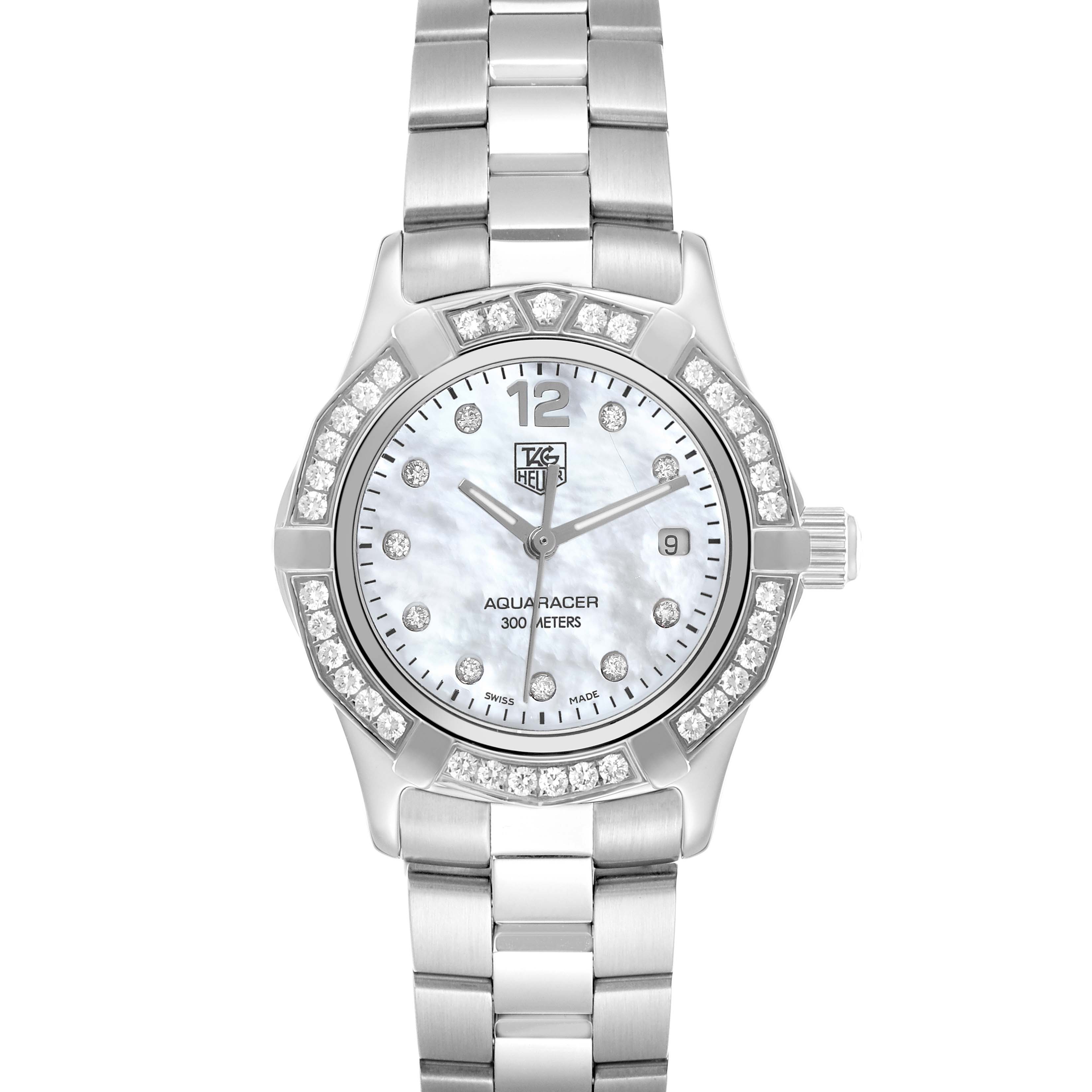 The Tag Heuer Aquaracer model WAF1416 watch is shown from a top-down angle, displaying the face, bezel adorned with gems, and the top part of the bracelet.
