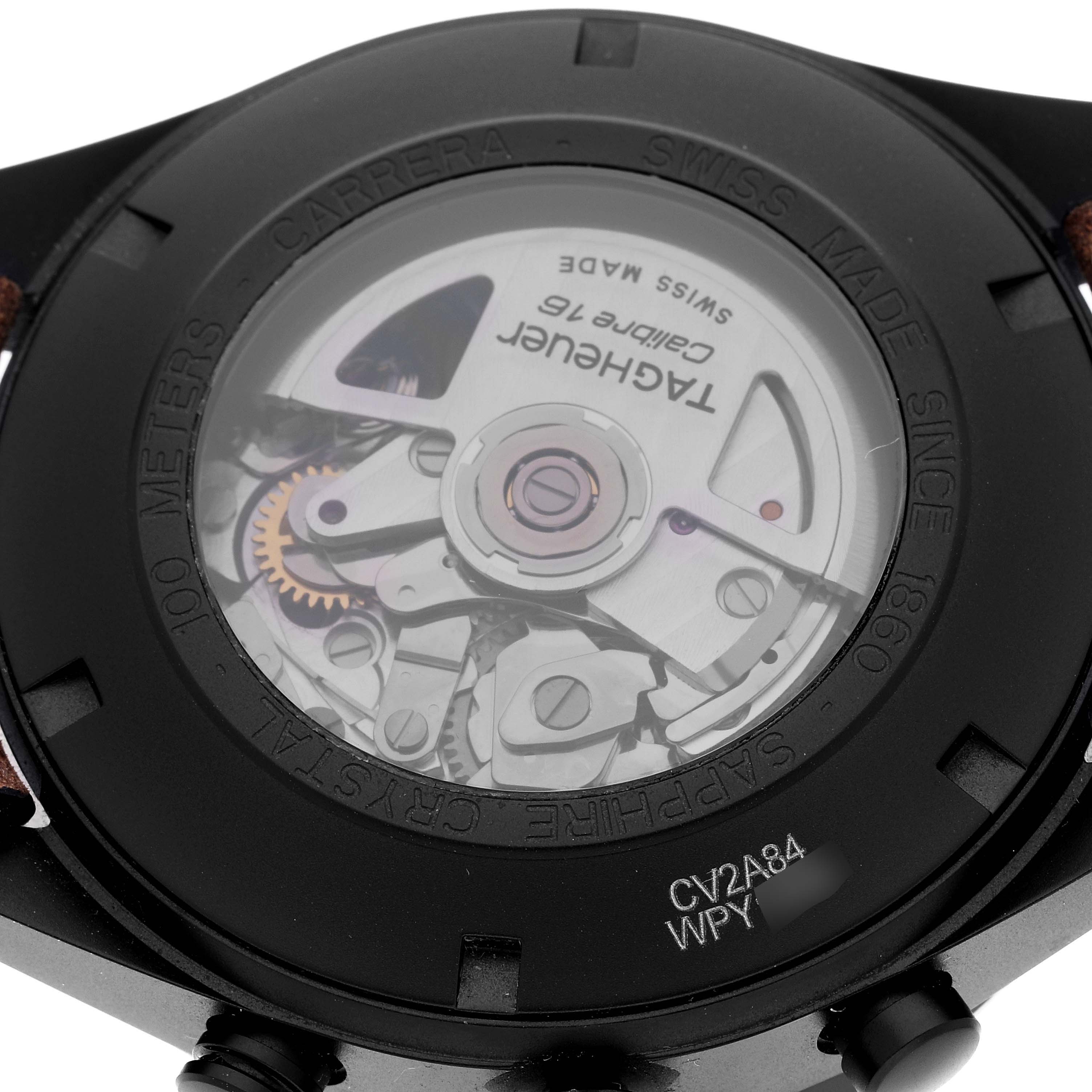 This image shows the back of a Tag Heuer Carrera CV2A84.FC6394 Men's Titanium Black Dial CV2A84.FC6394 Men's Titanium Black Dial watch, displaying its internal movement and "Calibre 16" mechanism.