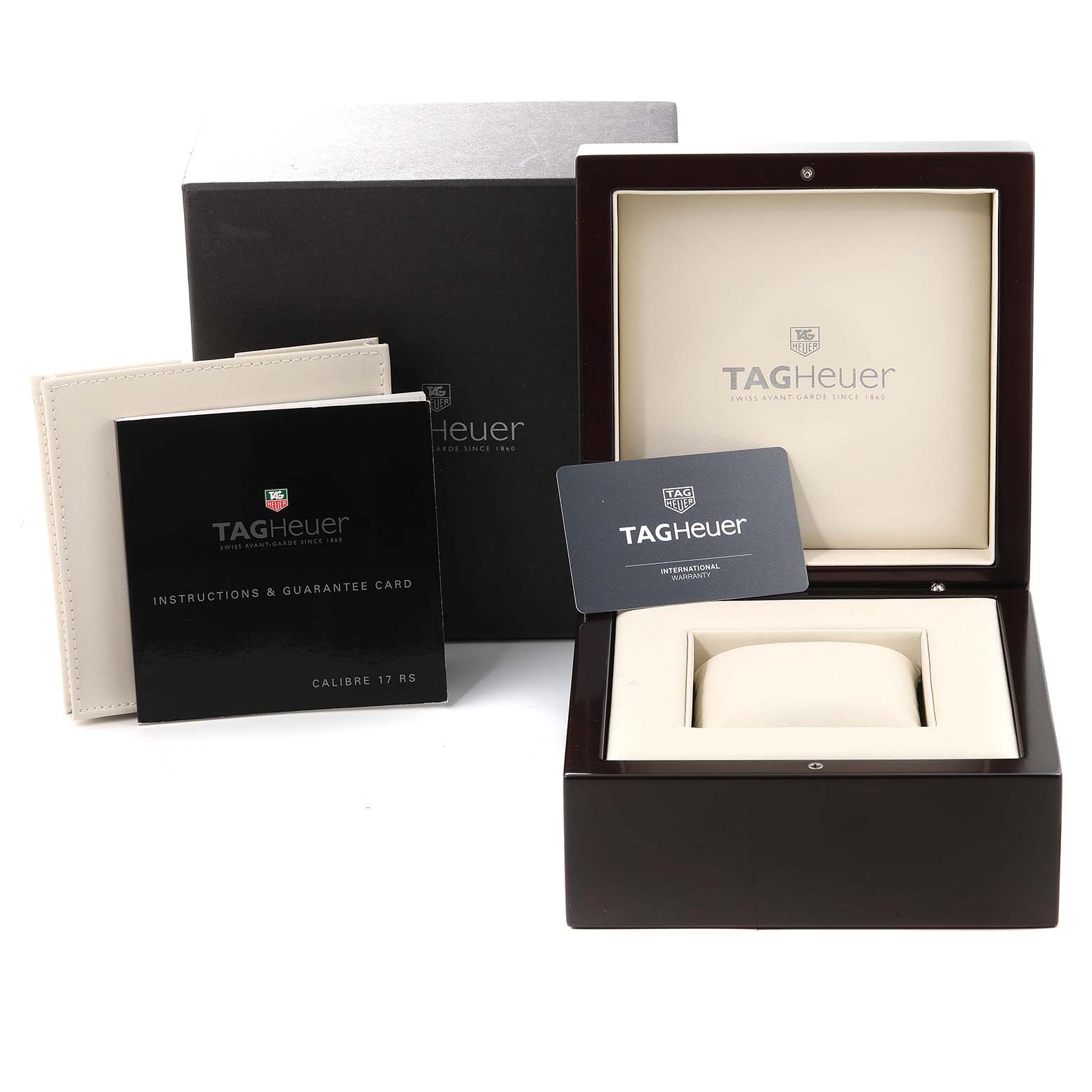 The image shows the packaging, box, and documents for a Carrera model by Tag Heuer.