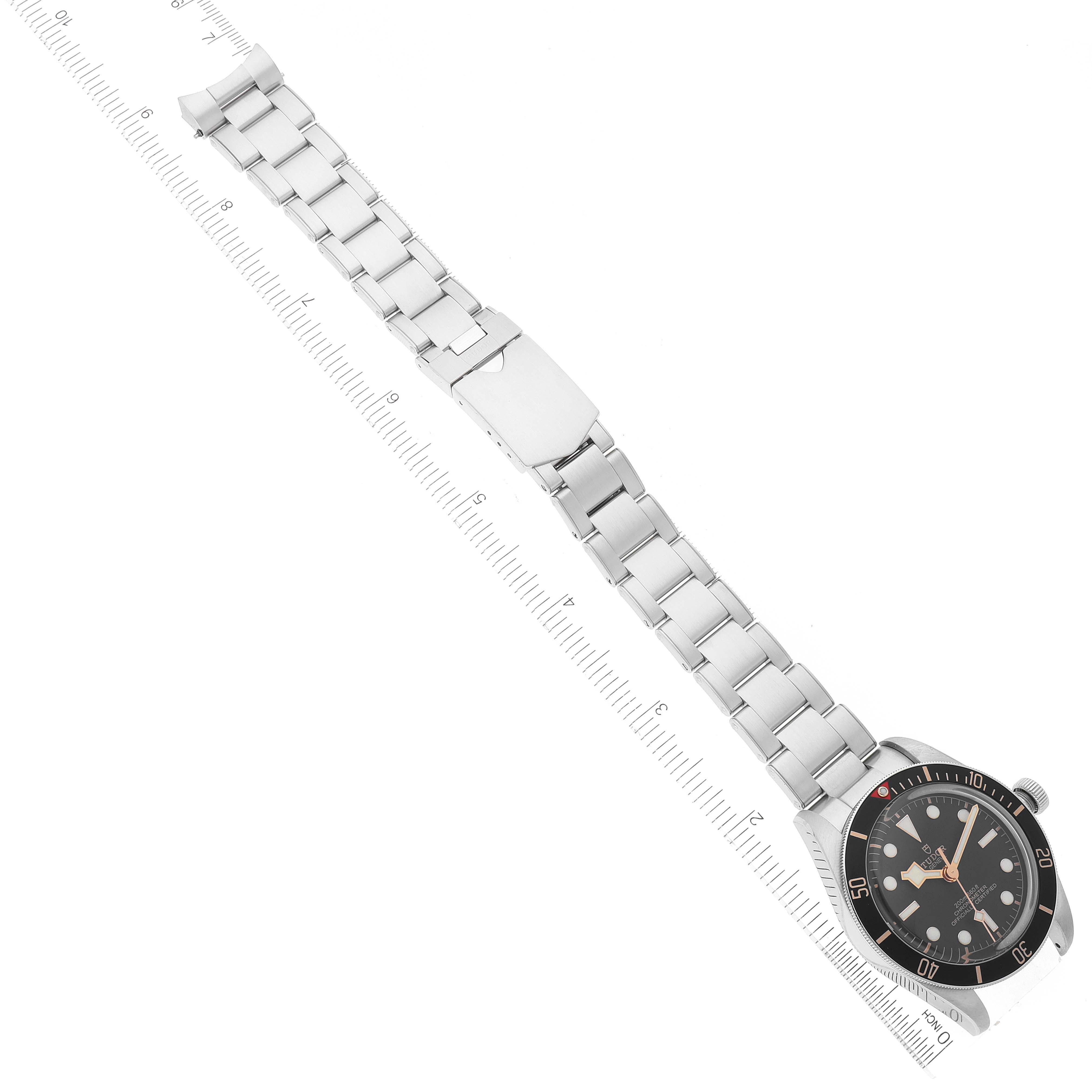 This image shows a top-down view of a Tudor Heritage Black Bay 79030N Men
s Stainless Steel Black Dial 79030N Men
s Stainless Steel Black Dial watch, including its stainless steel bracelet and partial bezel.