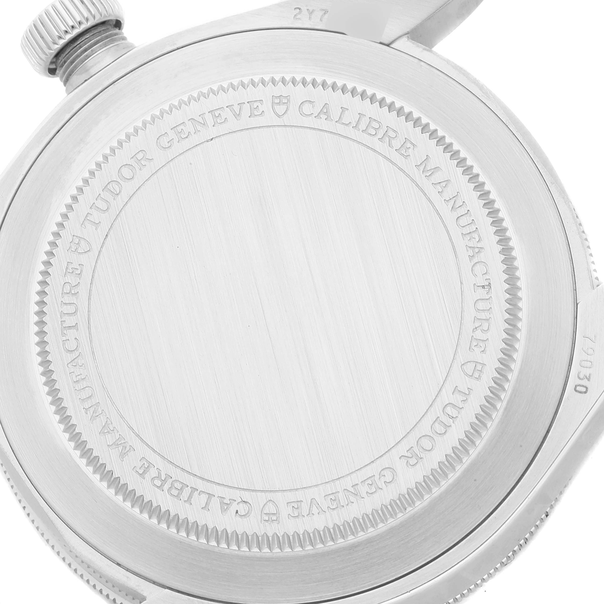 The image shows the case back of a Tudor Heritage Black Bay 79030N Men
s Stainless Steel Black Dial 79030N Men
s Stainless Steel Black Dial watch, displaying the engraved details.