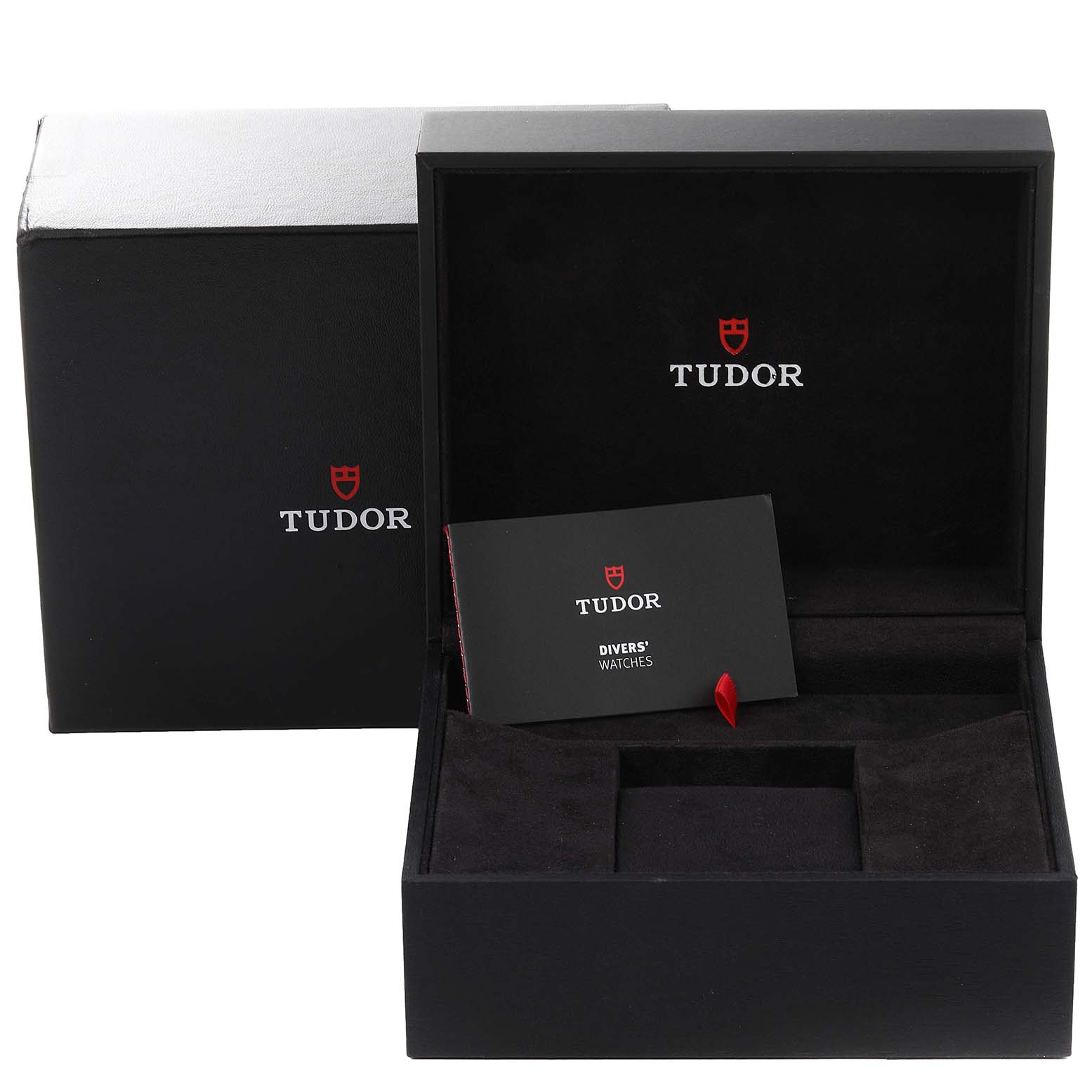 The image shows a Tudor Heritage Black Bay 79030N Men
s Stainless Steel Black Dial 79030N Men
s Stainless Steel Black Dial watch box with a pamphlet inside, viewed from the front angle.