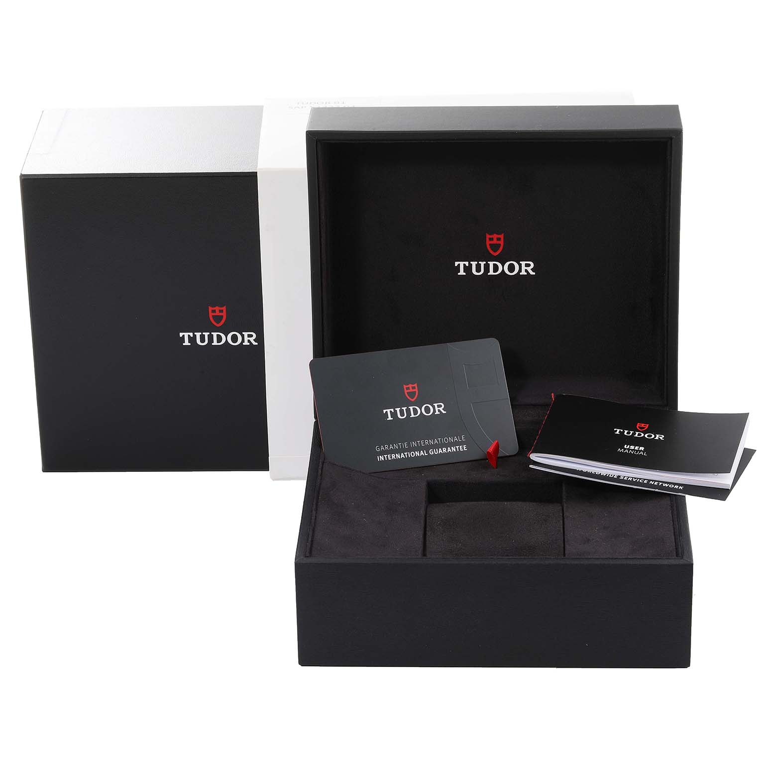 The image shows the packaging, warranty card, and manuals for the Tudor Heritage Black Bay 79830RB Men's Stainless Steel Black Dial 79830RB Men's Stainless Steel Black Dial watch.