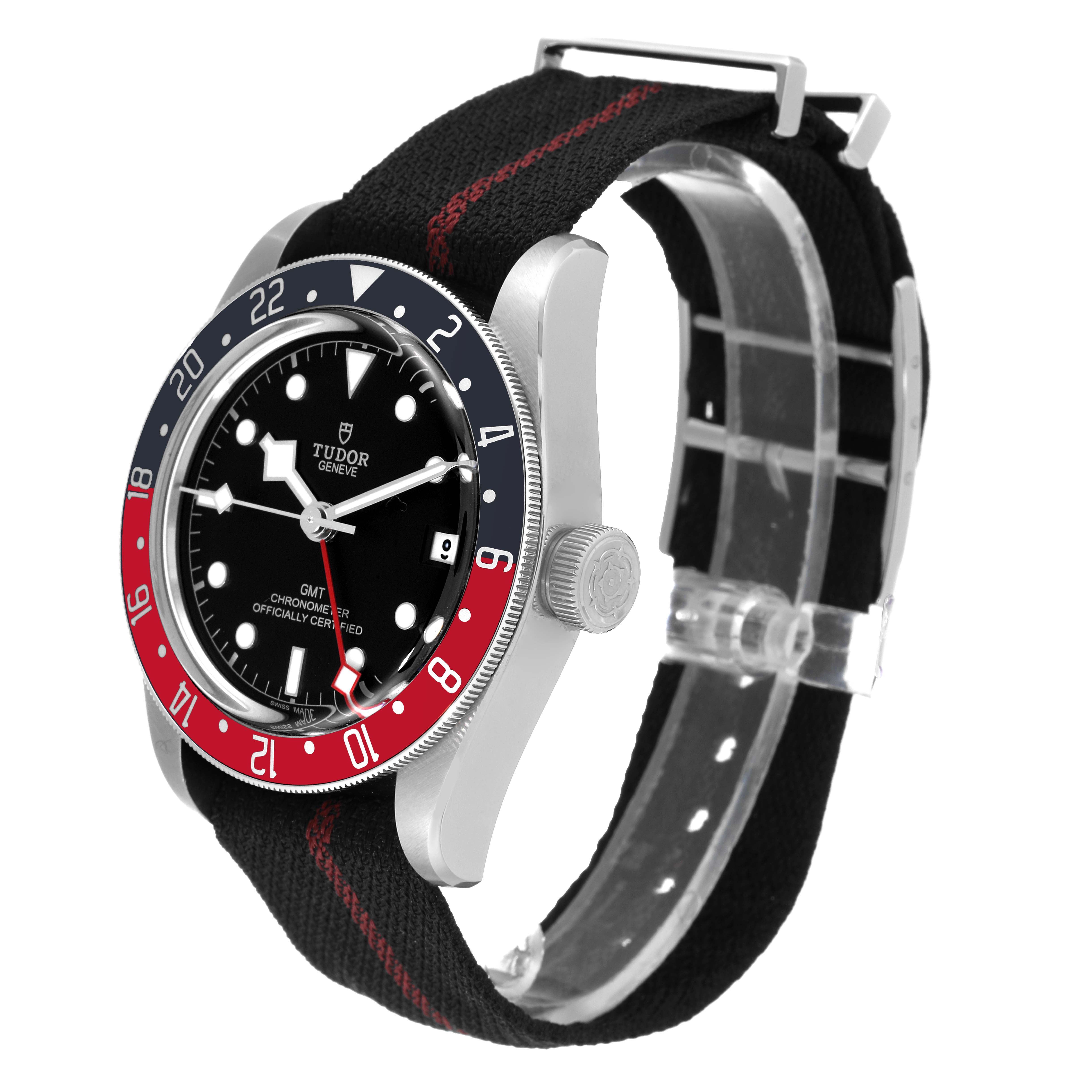 This Heritage Black Bay model by Tudor is shown at an angle highlighting its face, bezel, and fabric strap.