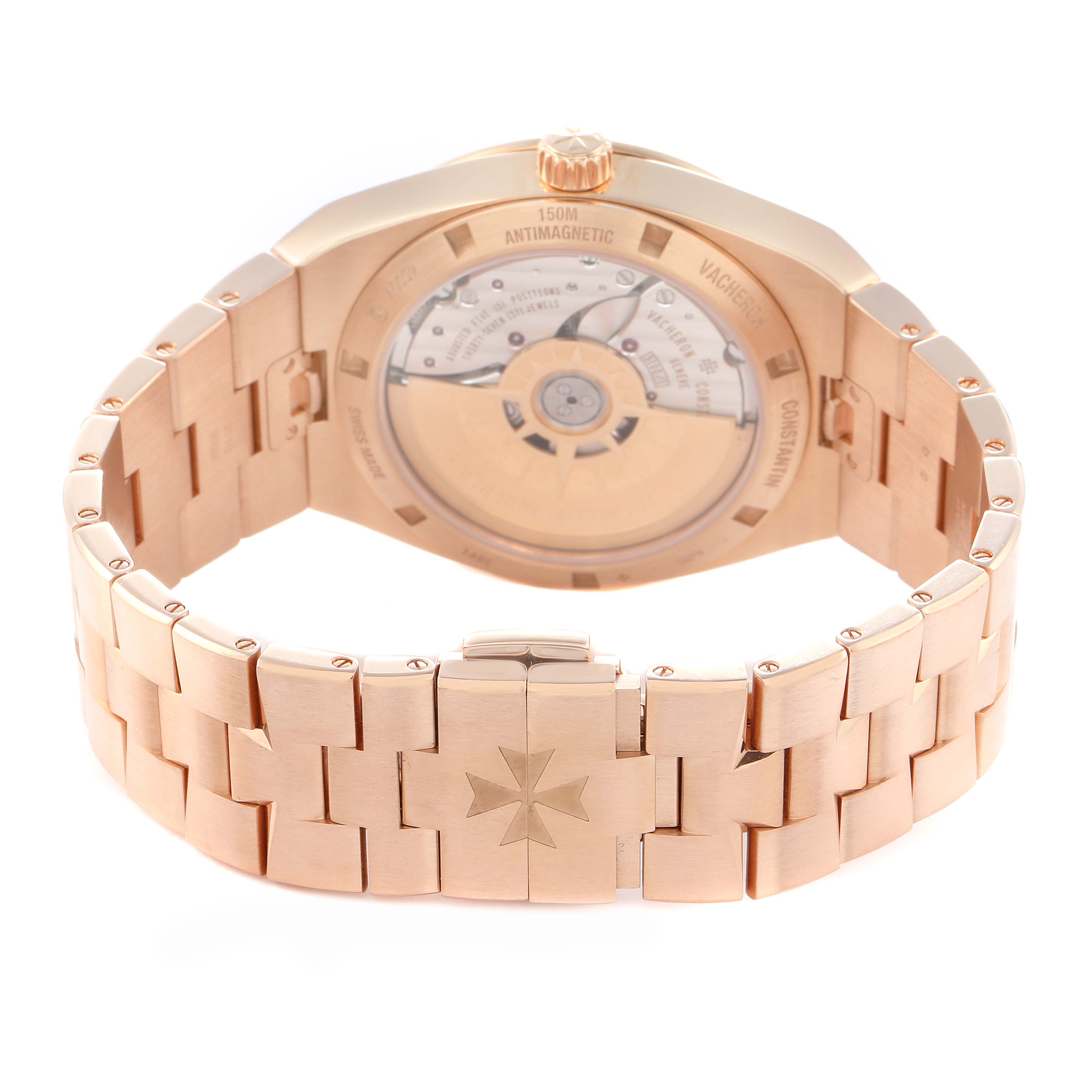 The image shows the back view of the Vacheron Constantin Overseas model 4500V, highlighting the exhibition case back and rose gold bracelet with a Maltese cross clasp.