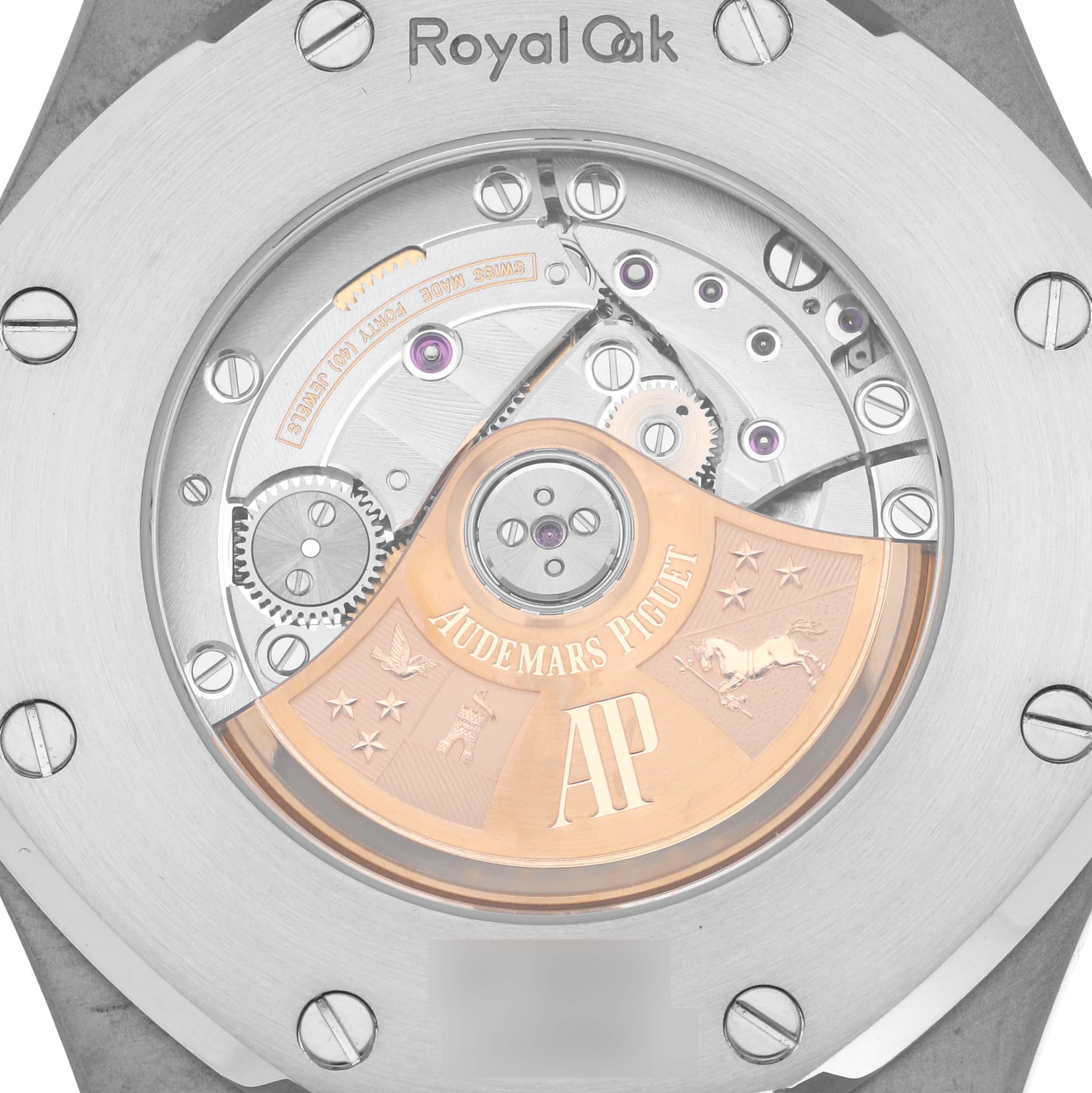 This image shows the back view of the Royal Oak model by Audemars Piguet, highlighting the movement and rotor.
