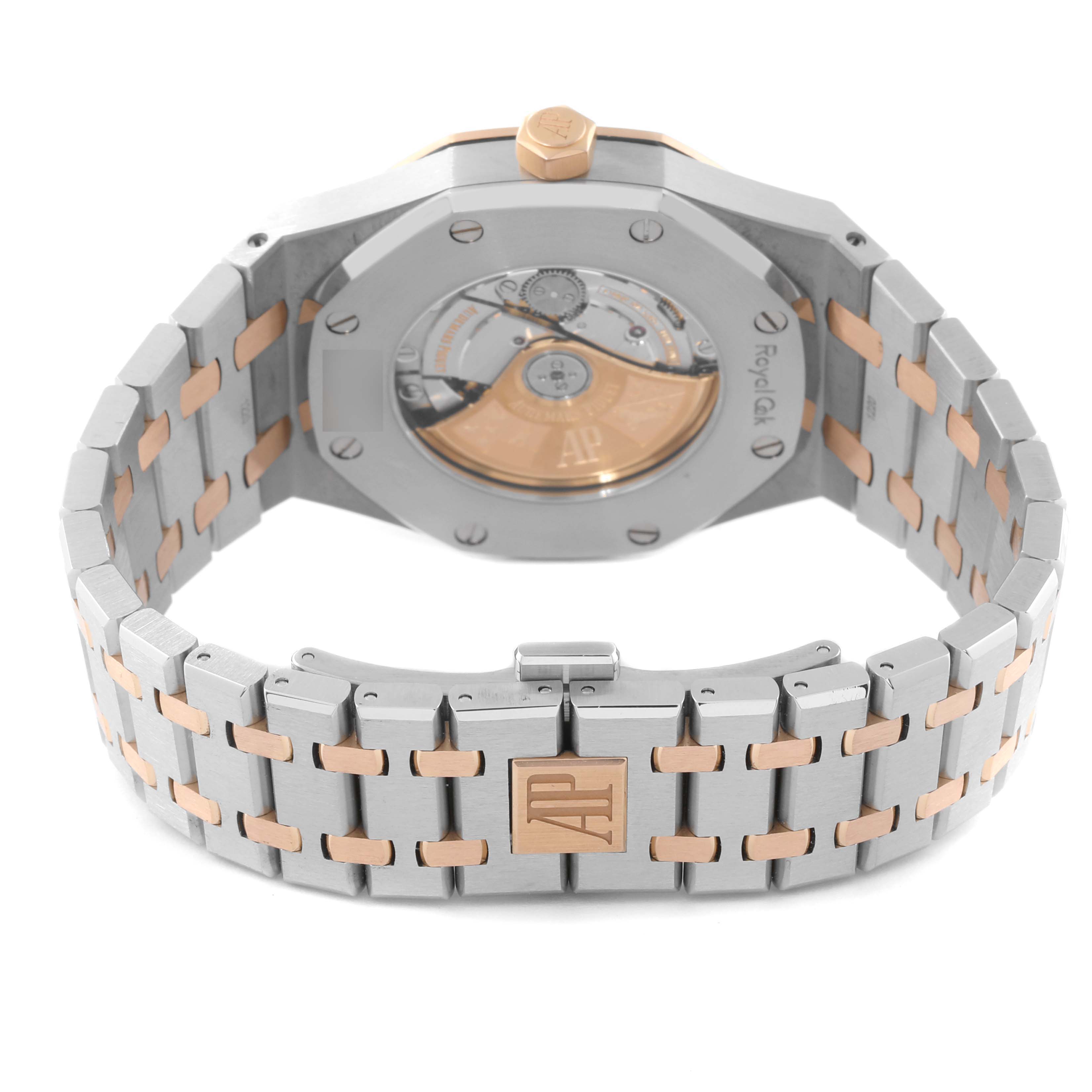 The image shows the back of the Audemars Piguet Royal Oak 15000TR Men's Steel and Gold (two tone) Silver Dial 15000TR Men's Steel and Gold (two tone) Silver Dial watch, highlighting its bracelet and exhibition case back.