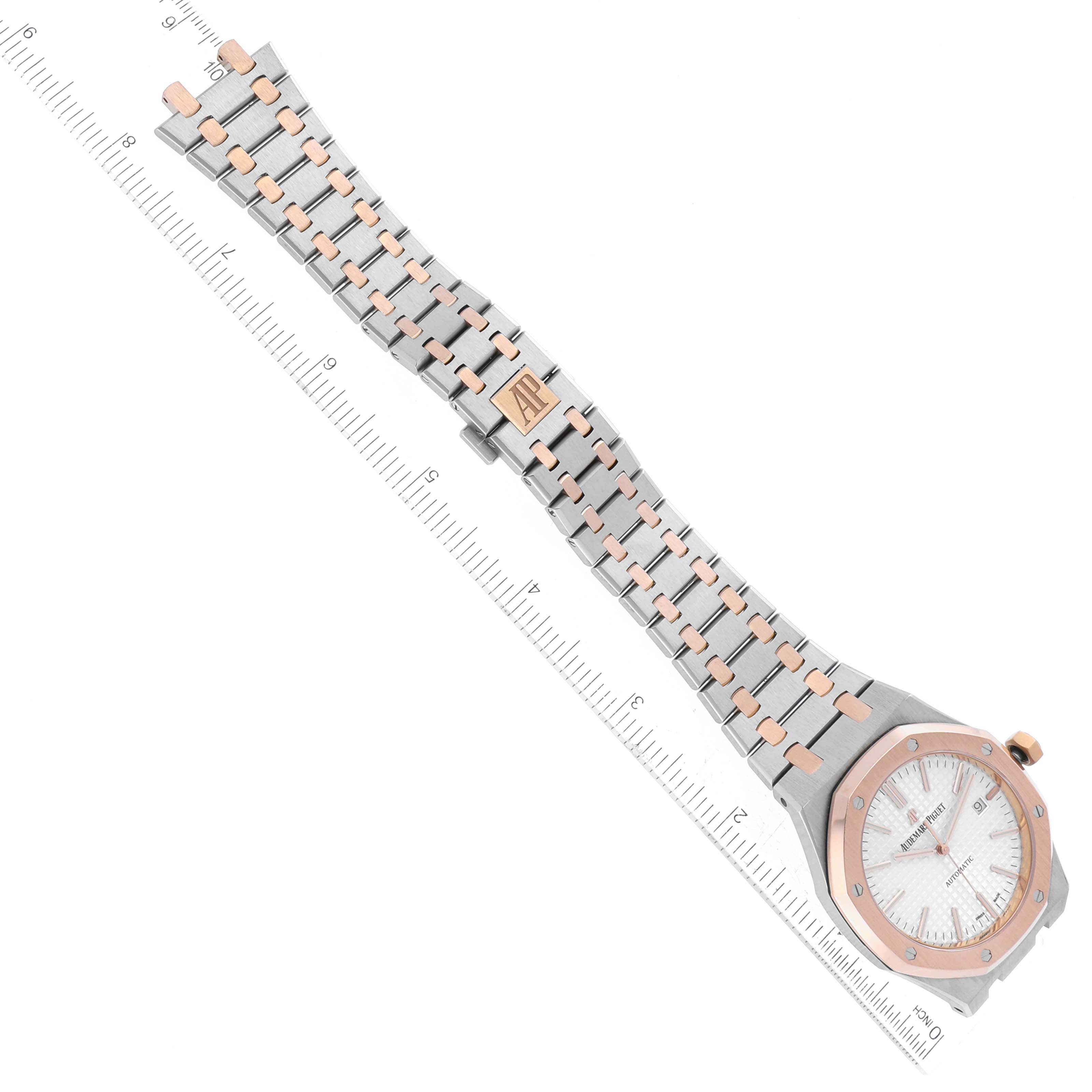 The image shows a top-down view of the Audemars Piguet Royal Oak 15000TR Men's Steel and Gold (two tone) Silver Dial 15000TR Men's Steel and Gold (two tone) Silver Dial watch, highlighting its two-tone bracelet and octagonal bezel.