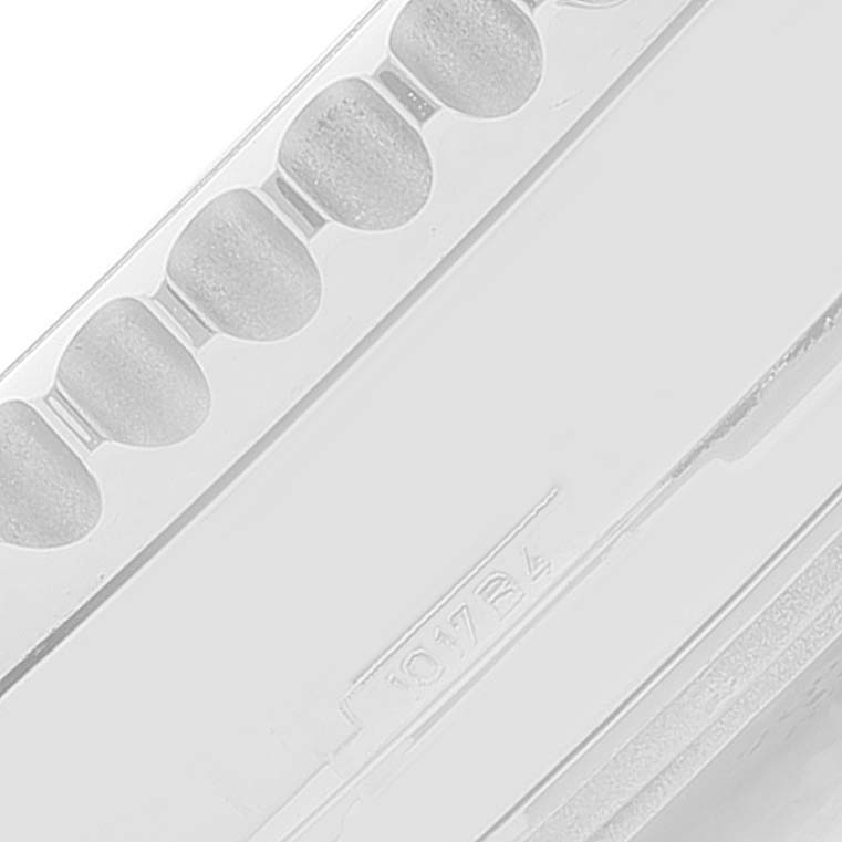 This close-up angle shows a part of the bezel or a component with grooves from a Breitling Navitimer AB0120 Men
s Stainless Steel Silver Dial AB0120 Men
s Stainless Steel Silver Dial watch.