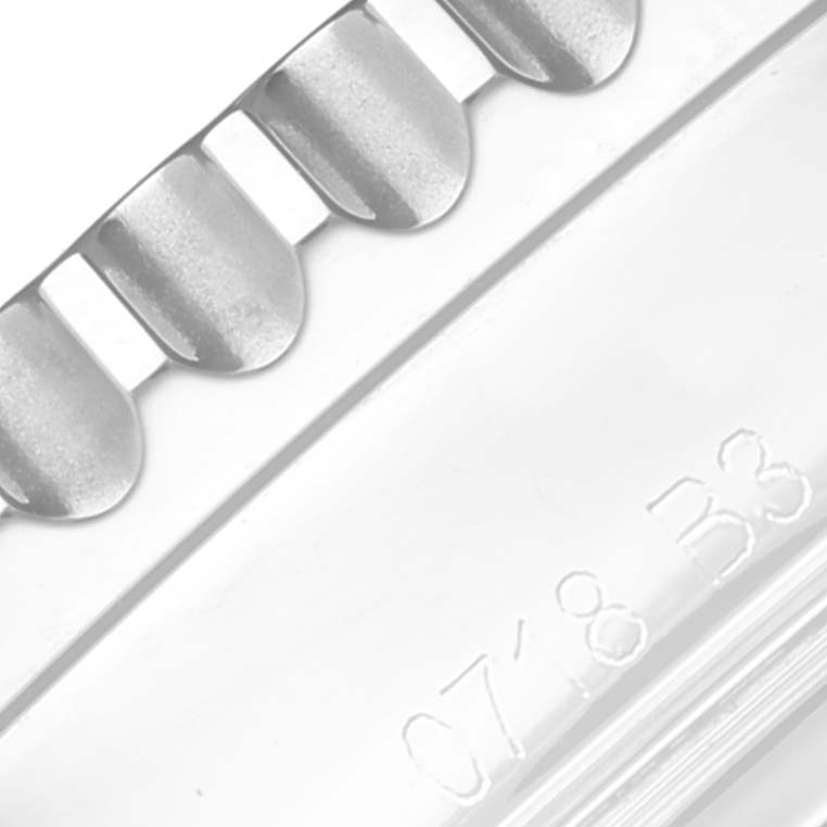 The image shows a close-up of the bezel and case edge of a Breitling Navitimer AB0120 Men's Stainless Steel Silver Dial AB0120 Men's Stainless Steel Silver Dial watch.