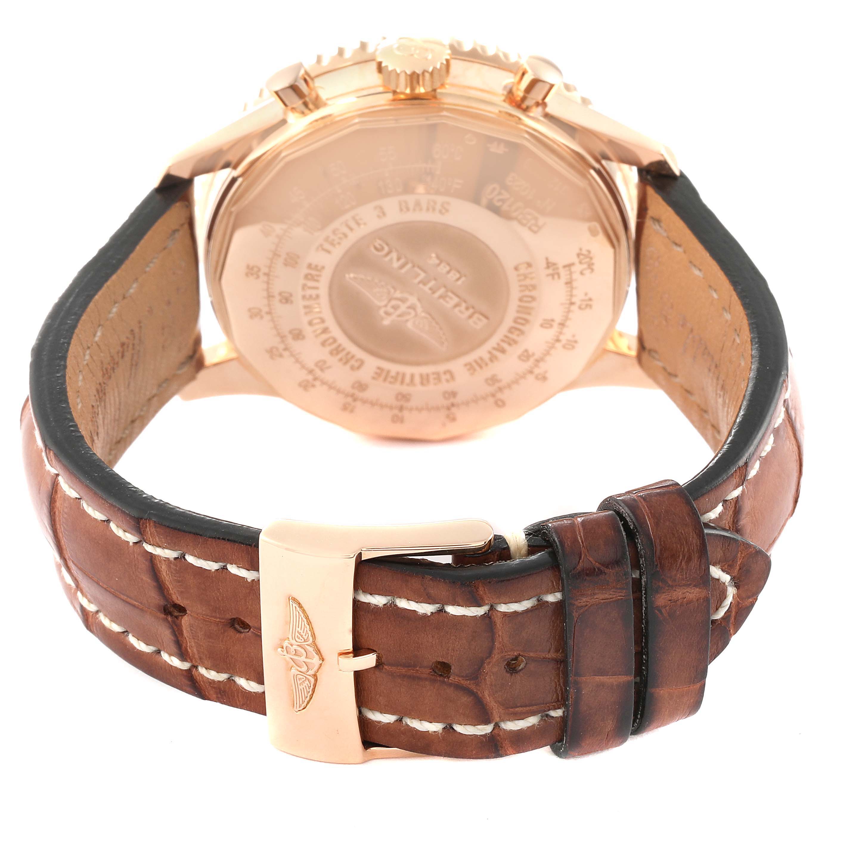 The image shows the back angle of the Breitling Navitimer RB0120 Men's Rose Gold Black Dial RB0120 Men's Rose Gold Black Dial watch, including its case back, crown, chronograph pushers, and leather strap.