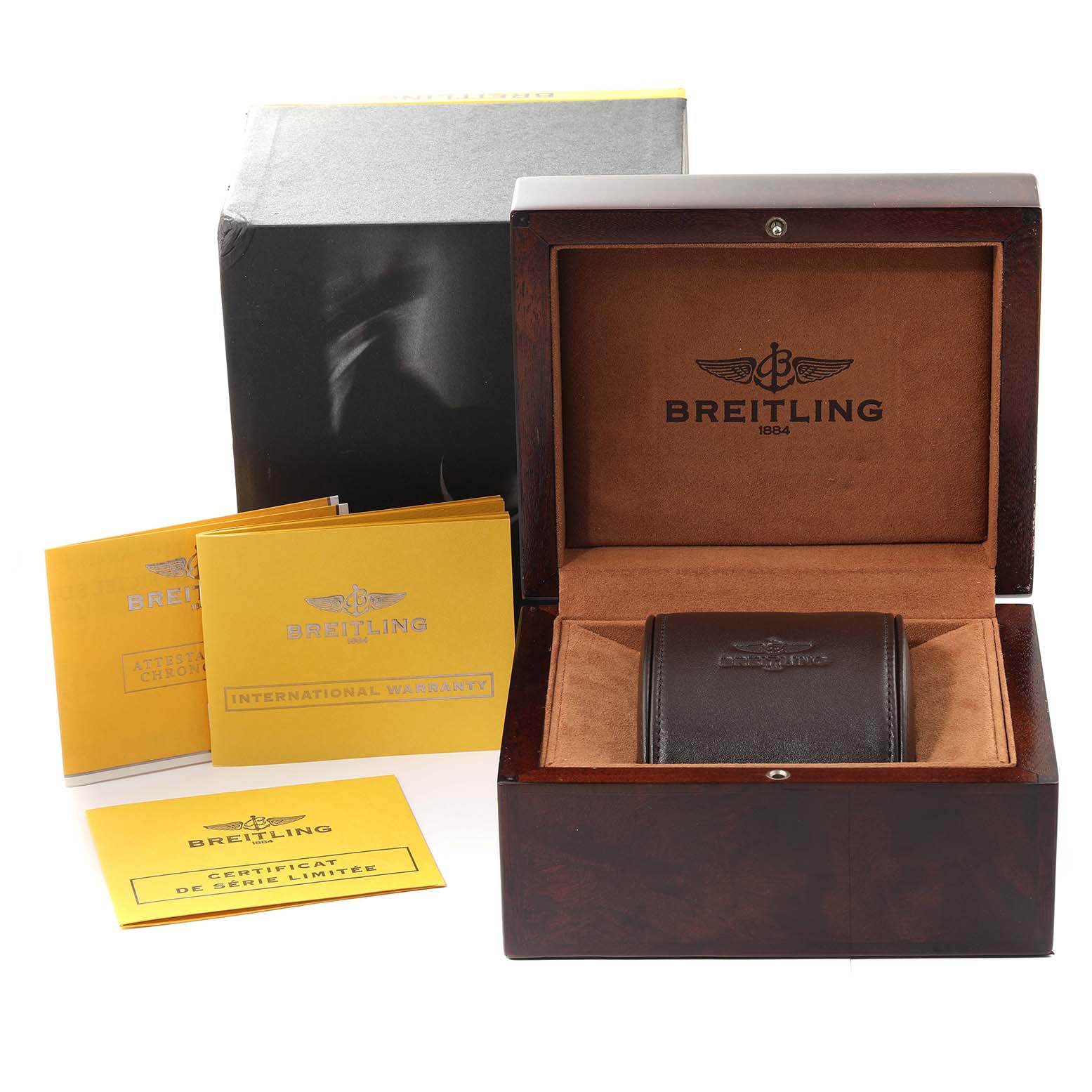 The image shows the packaging, manuals, and case for a Breitling Navitimer R13323 Men's Rose Gold Black Dial R13323 Men's Rose Gold Black Dial watch.