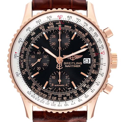The Breitling Navitimer watch is shown from the front, highlighting the dial, bezel, chronograph subdials, and crown.