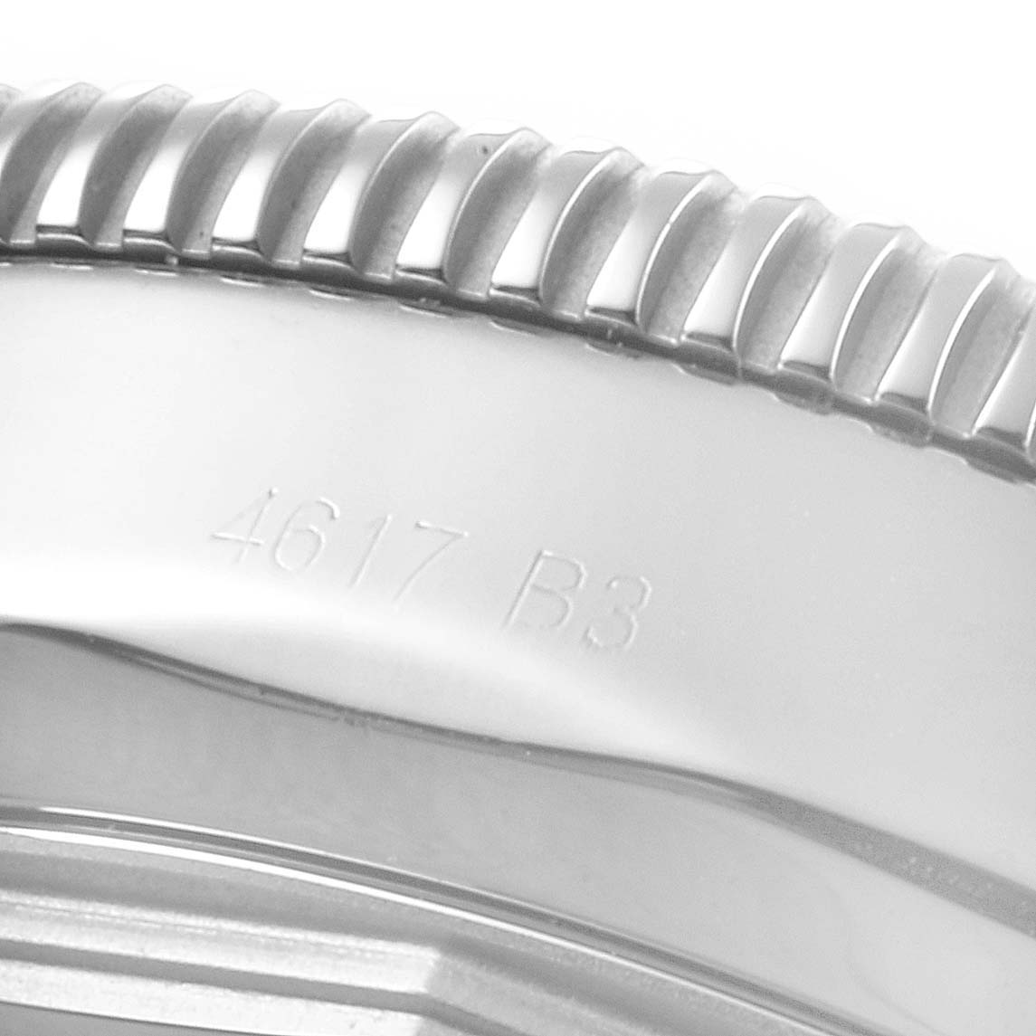 The image shows a close-up of the bezel and case side of a Breitling Superocean AB202016-C961-152A Men
s Stainless Steel Black Dial AB202016-C961-152A Men
s Stainless Steel Black Dial watch, including part of the model number engraving.