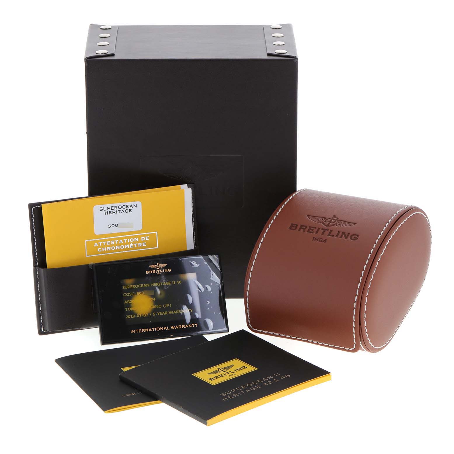 The image shows the packaging and accessories for the Breitling Superocean AB202016-C961-152A Men
s Stainless Steel Black Dial AB202016-C961-152A Men
s Stainless Steel Black Dial watch, including a box, leather case, warranty card, and booklets.