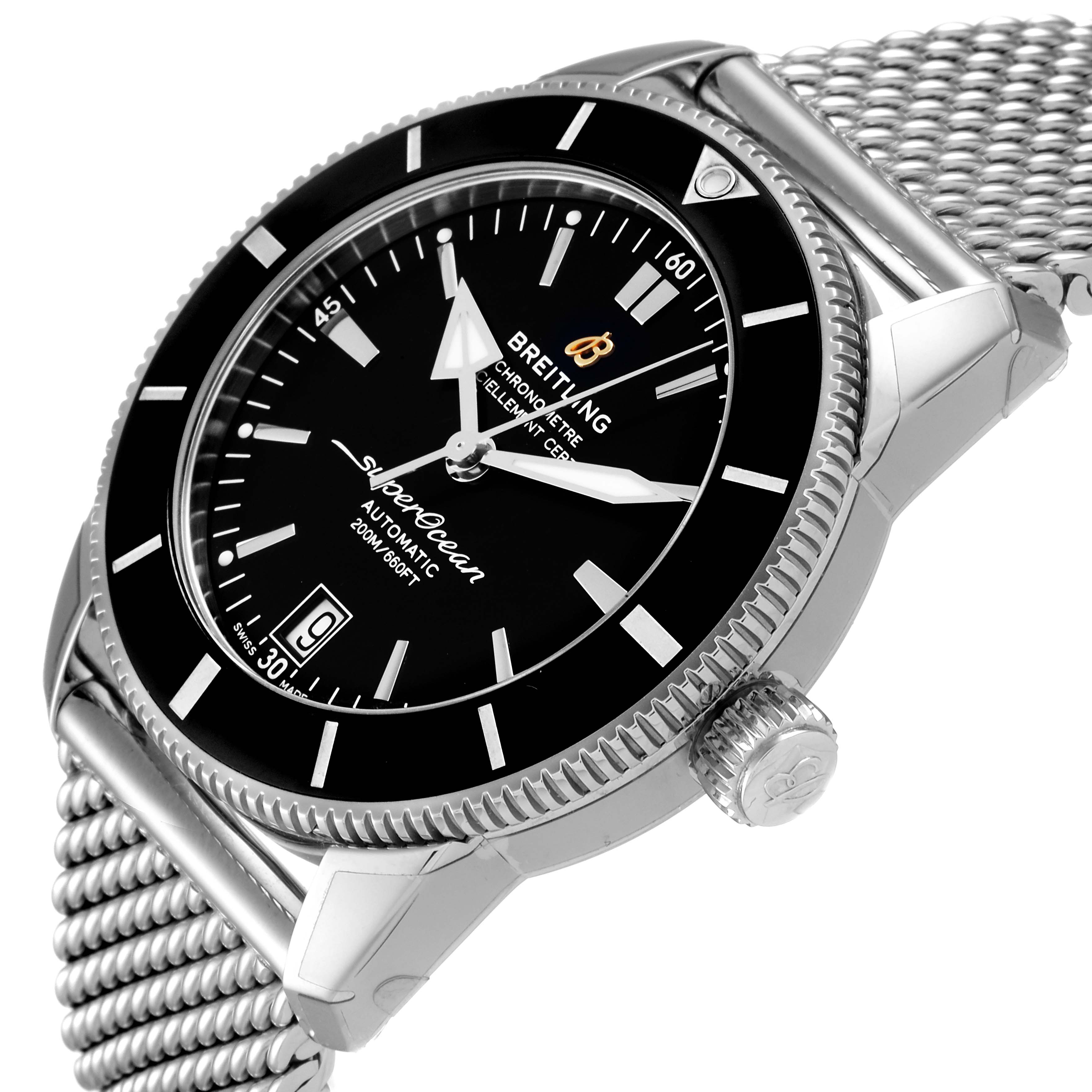 The image shows a close-up, side angle of the Breitling Superocean AB2010161C1A1 Men
s Stainless Steel Black Dial AB2010161C1A1 Men
s Stainless Steel Black Dial watch, featuring its dial, bezel, crown, and mesh bracelet.