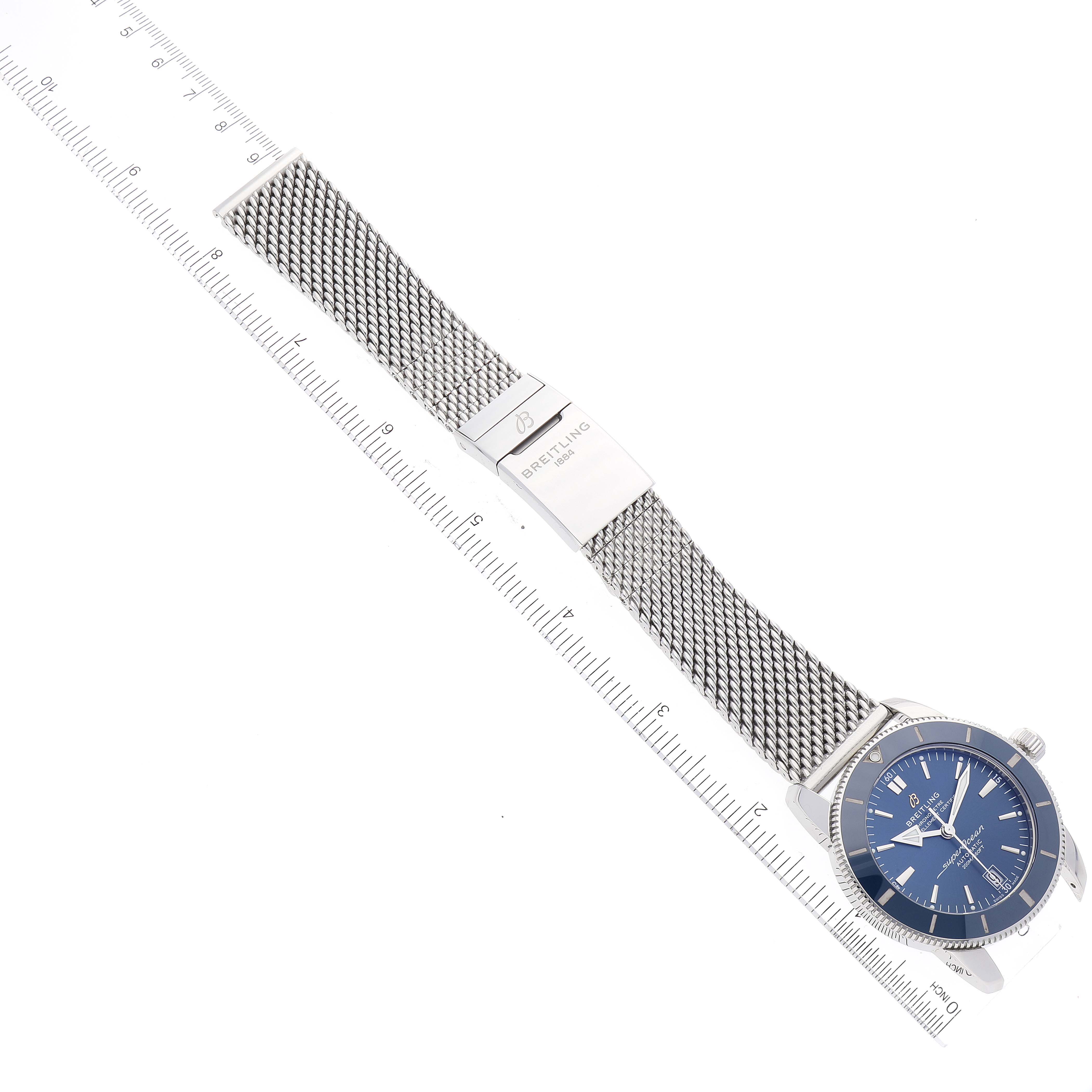 The Breitling Superocean AB2010 Men's Stainless Steel Blue Dial AB2010 Men's Stainless Steel Blue Dial watch is shown at an angle with its full strap, clasp, and dial visible.