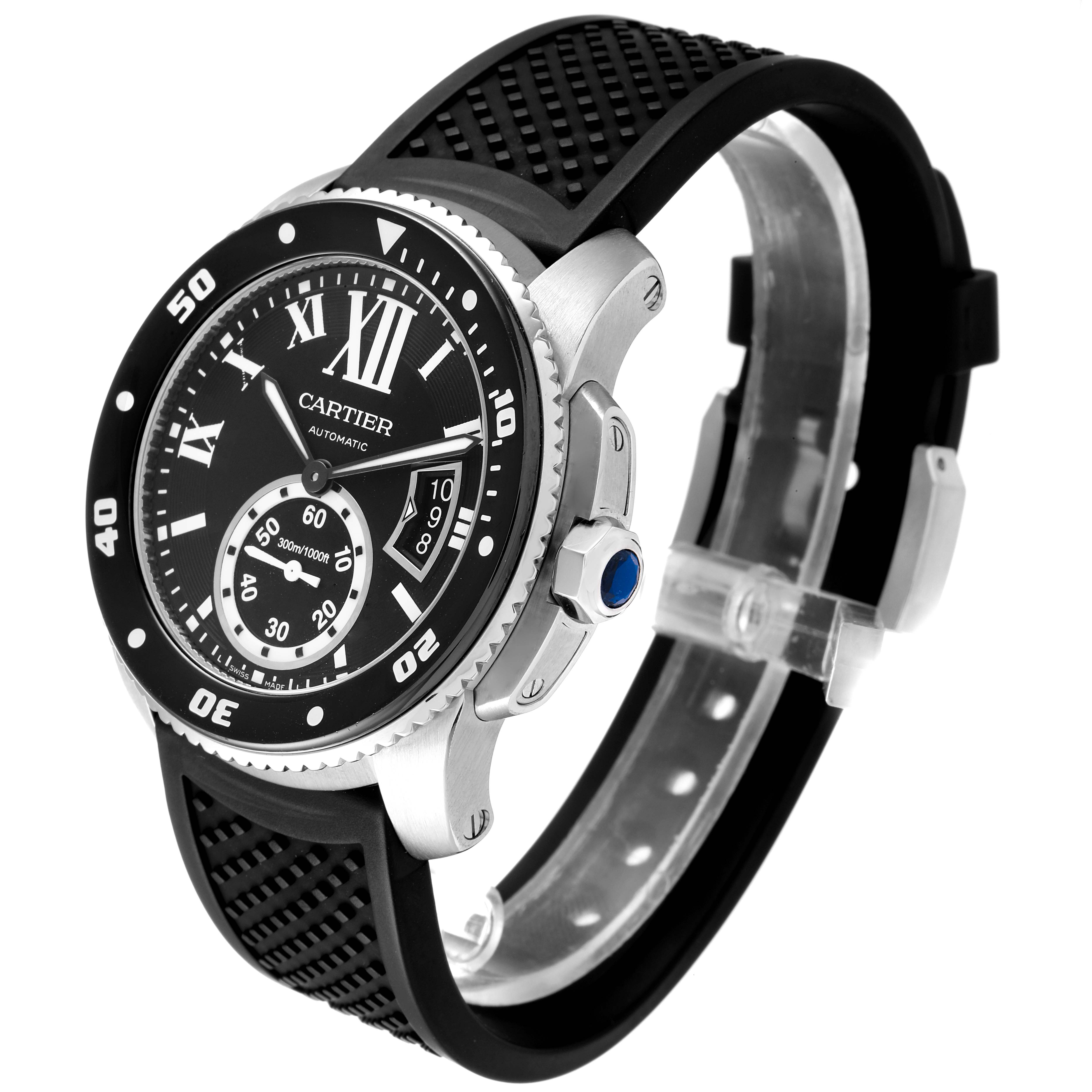The image shows a side and front angle of a Calibre de Cartier watch by Cartier, including its black dial, bezel, and rubber strap.