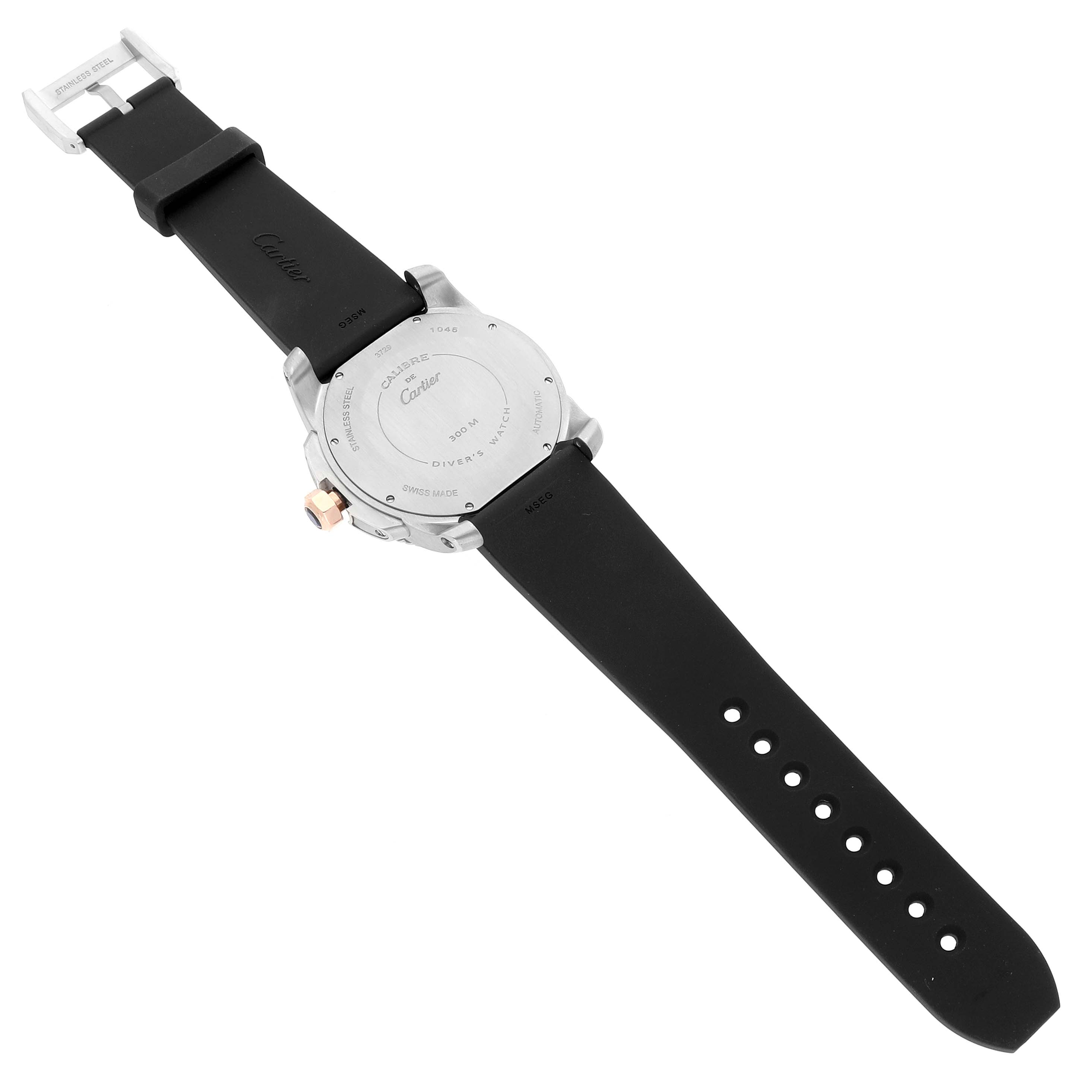 The image shows the back of a Calibre de Cartier watch, highlighting the case back and strap from a rear angle.