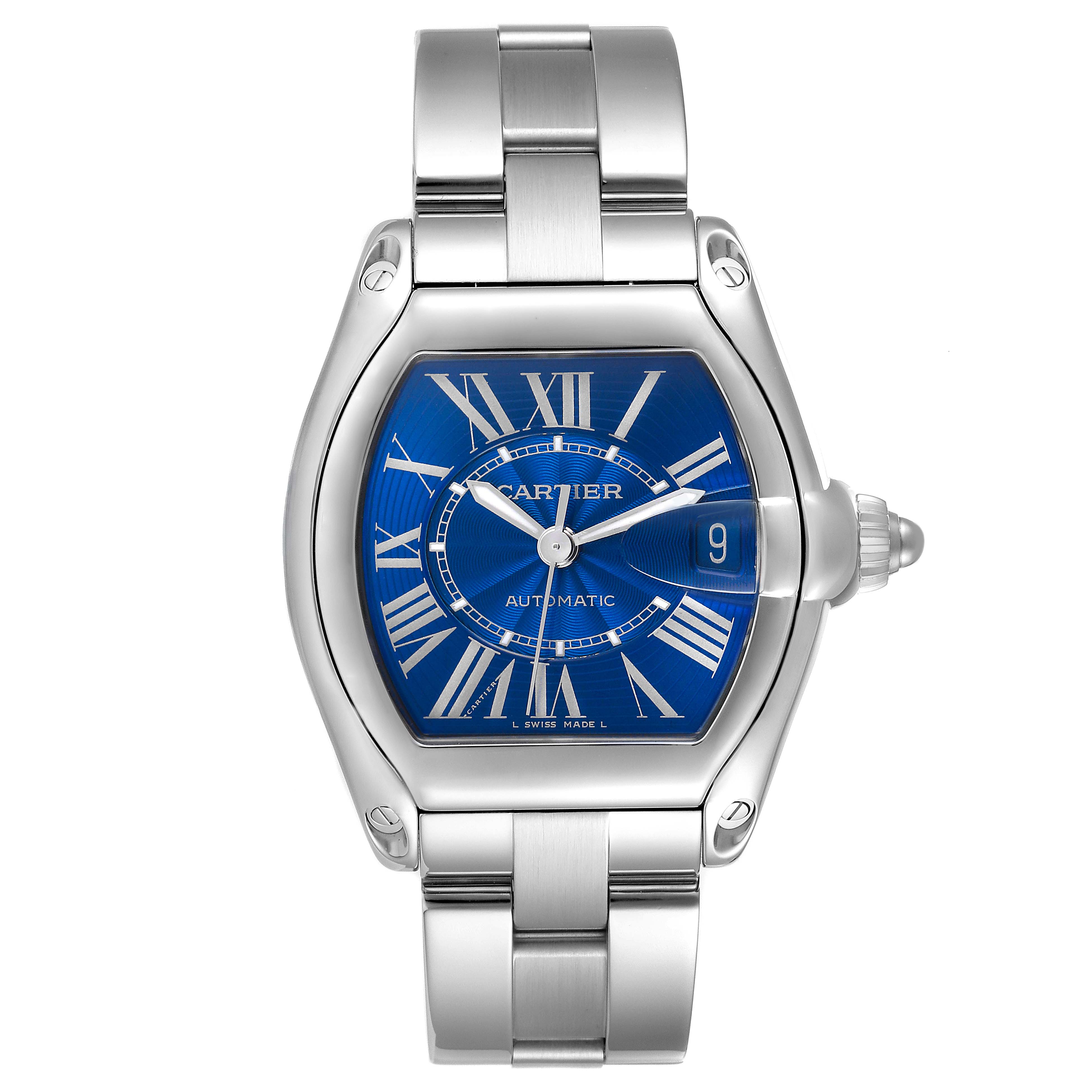 The Cartier Roadster W62048V3 Men's Stainless Steel Blue Dial watch is shown from the front, displaying its blue dial, silver bracelet, and distinctive crown.