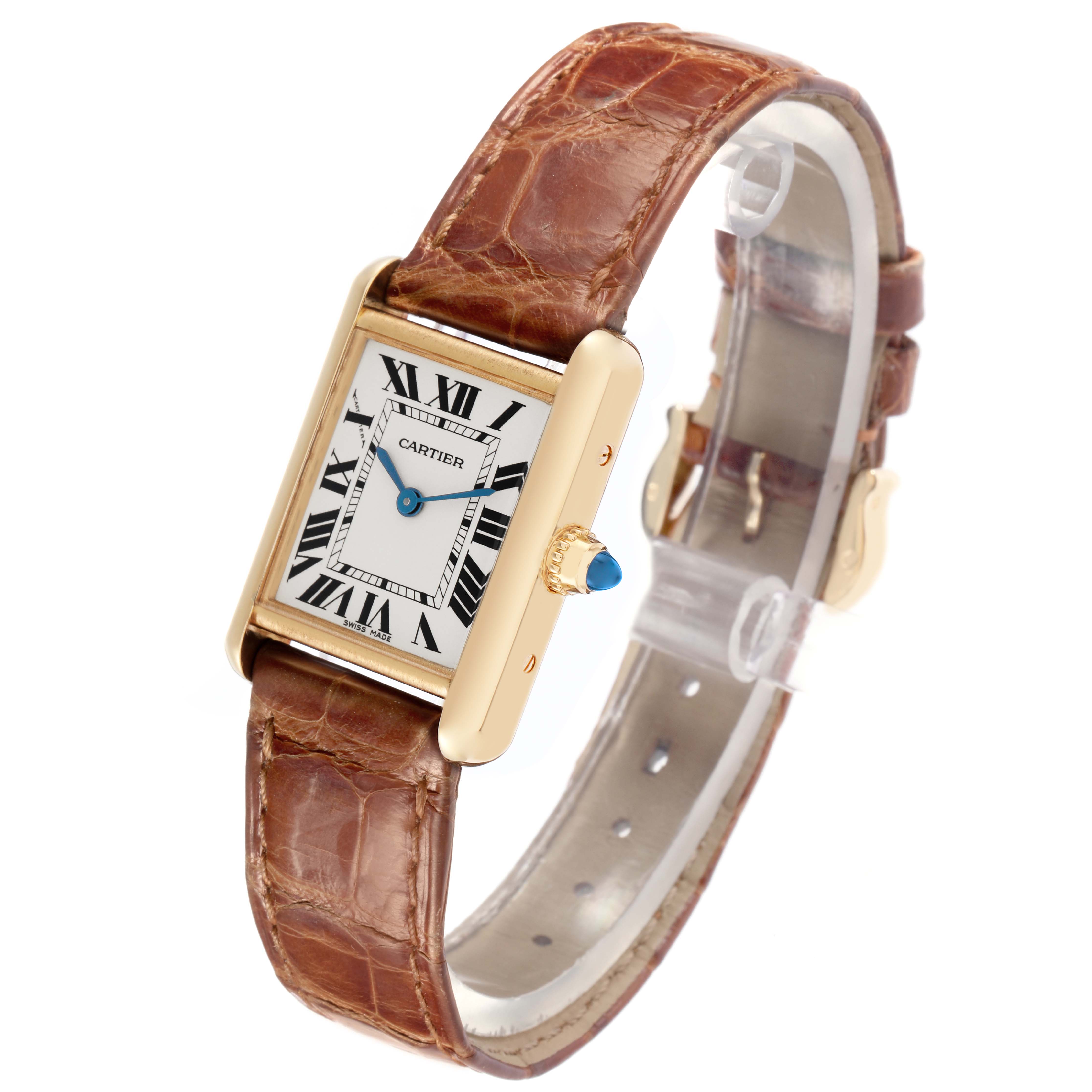 This image shows a Cartier Tank Louis W1529856 men's watch at an angle highlighting its rectangular dial, Roman numeral hour markers, and brown leather strap.