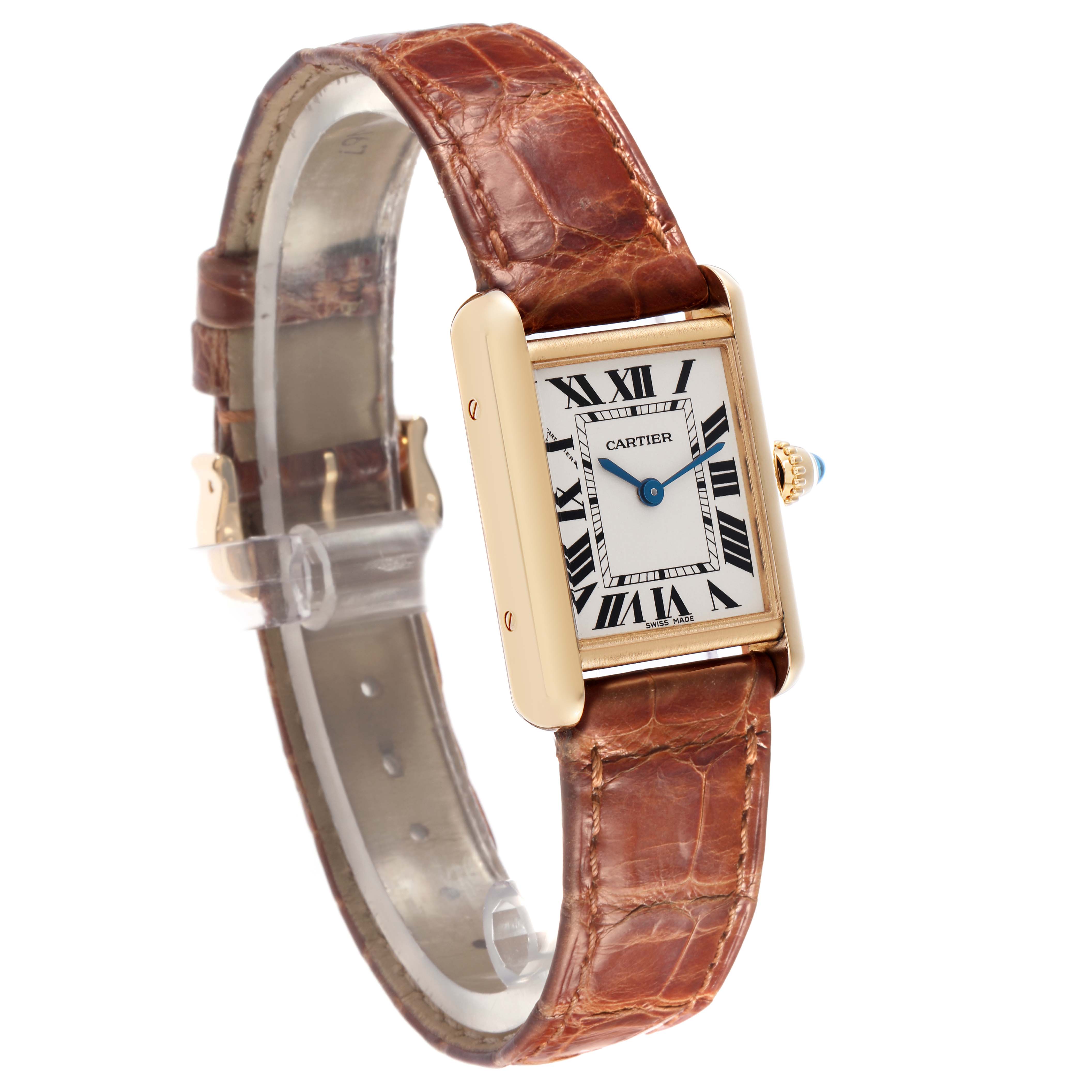 The Cartier Tank Louis model number W1529856 is shown at a three-quarter angle, displaying the rectangular case, Roman numeral dial, blue hands, and brown leather strap.