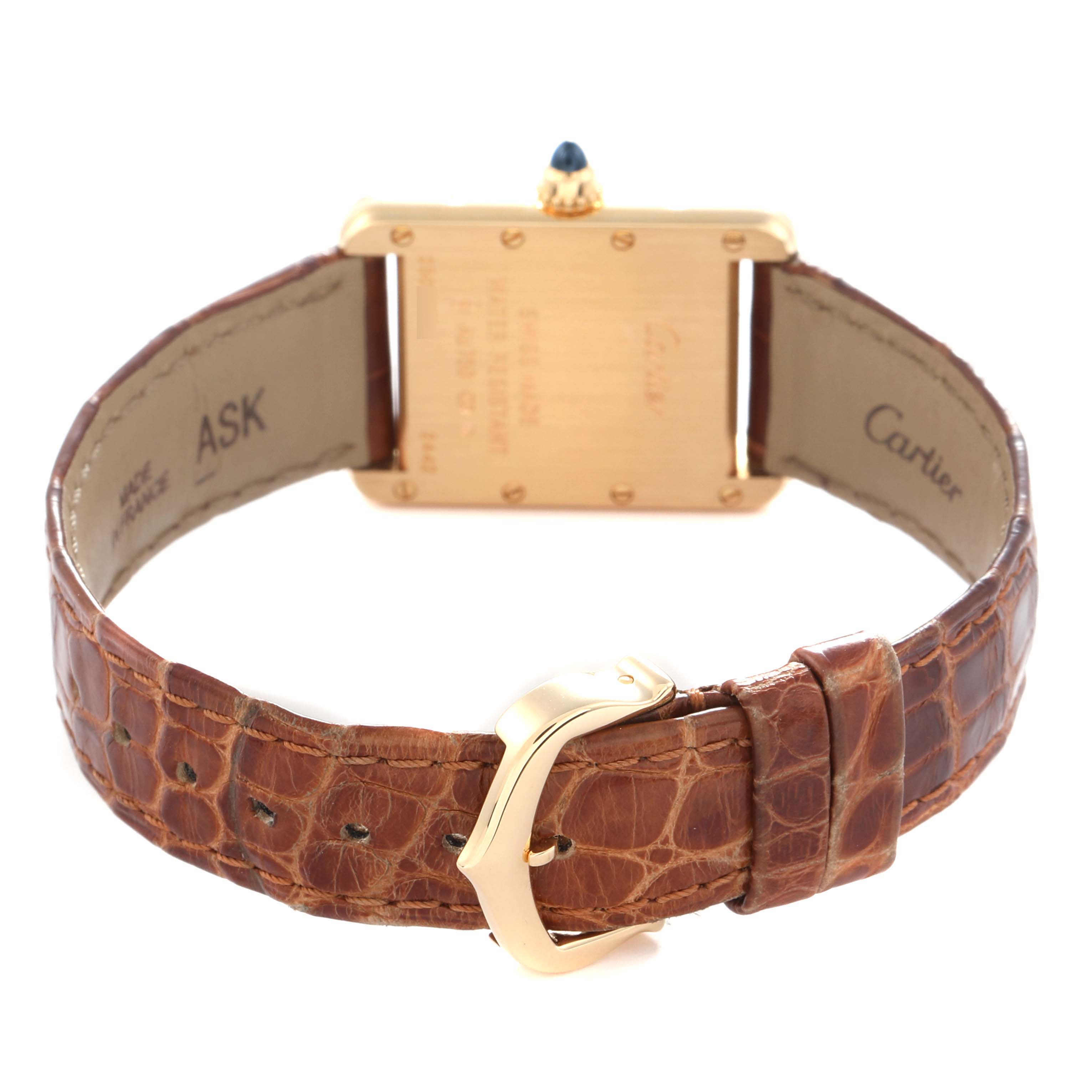 The image shows the back view of the Cartier Tank Louis model W1529856 men's watch, highlighting its case, strap, and buckle.