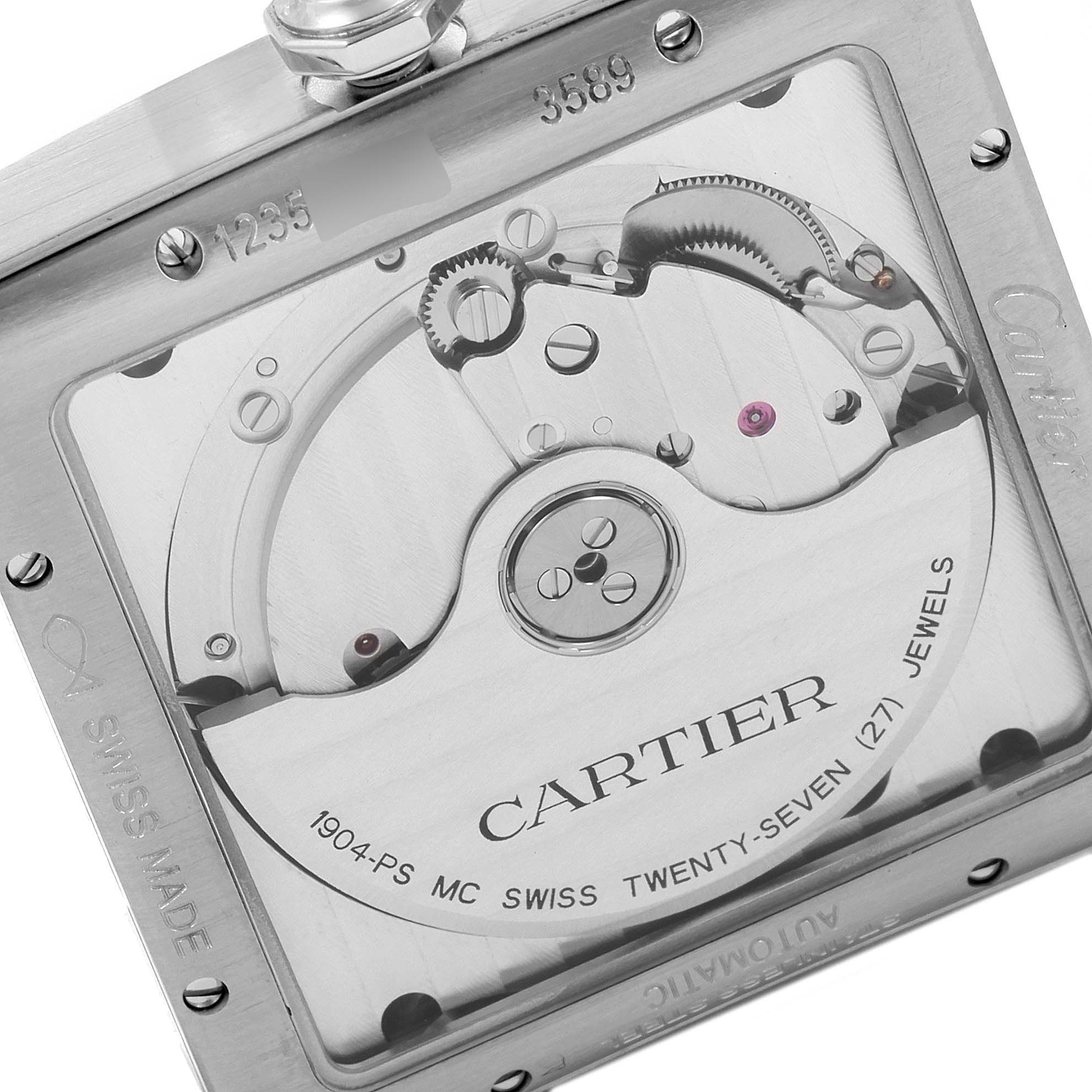 The image shows the back of the Cartier Tank MC W5330003 Men
s Stainless Steel Silver Dial W5330003 Men
s Stainless Steel Silver Dial watch, revealing the watch movement and engravings.