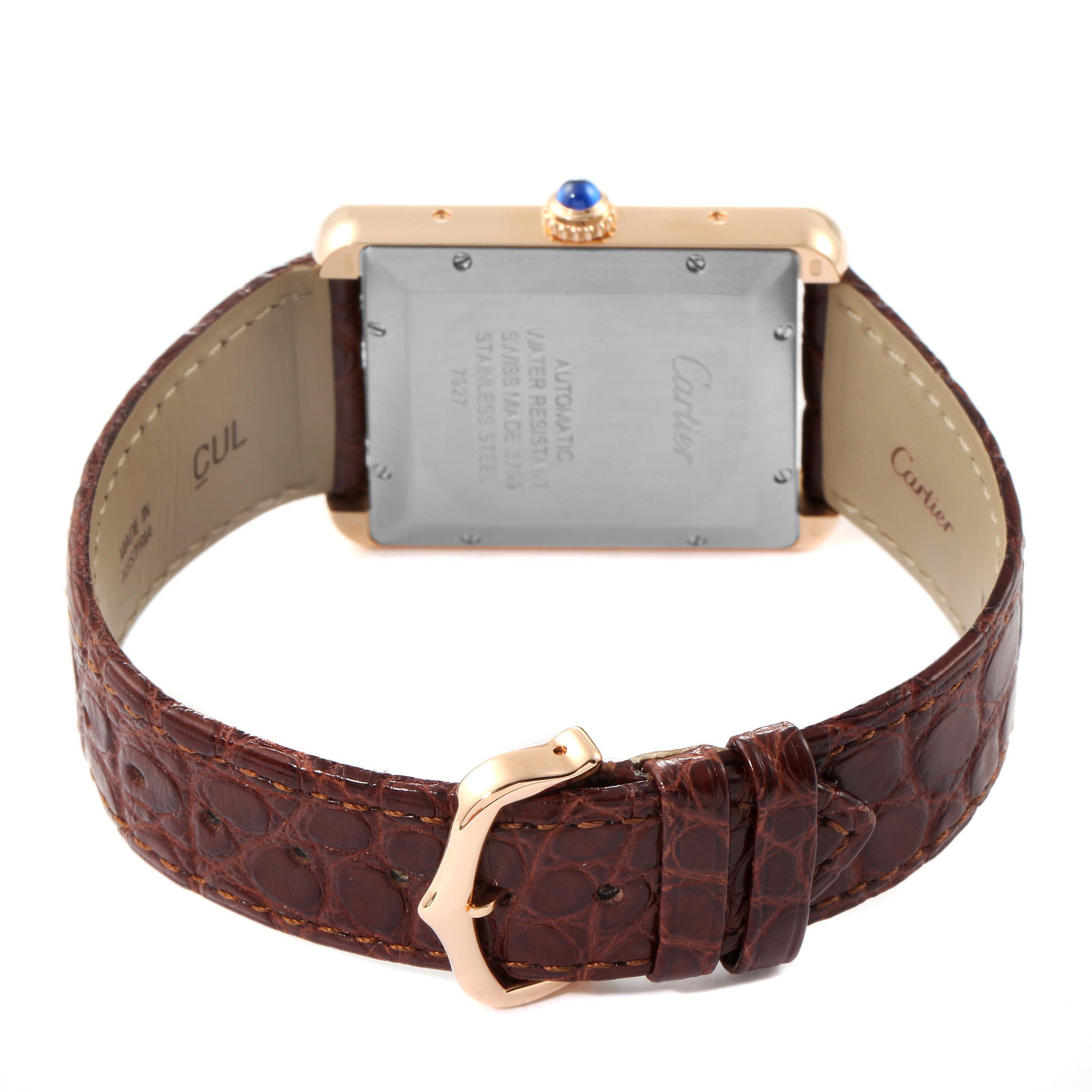 The image shows the back case and brown leather strap of the Cartier Tank Solo W5200026 Men's Rose Gold Silver Dial W5200026 Men's Rose Gold Silver Dial watch, along with the deployment buckle.