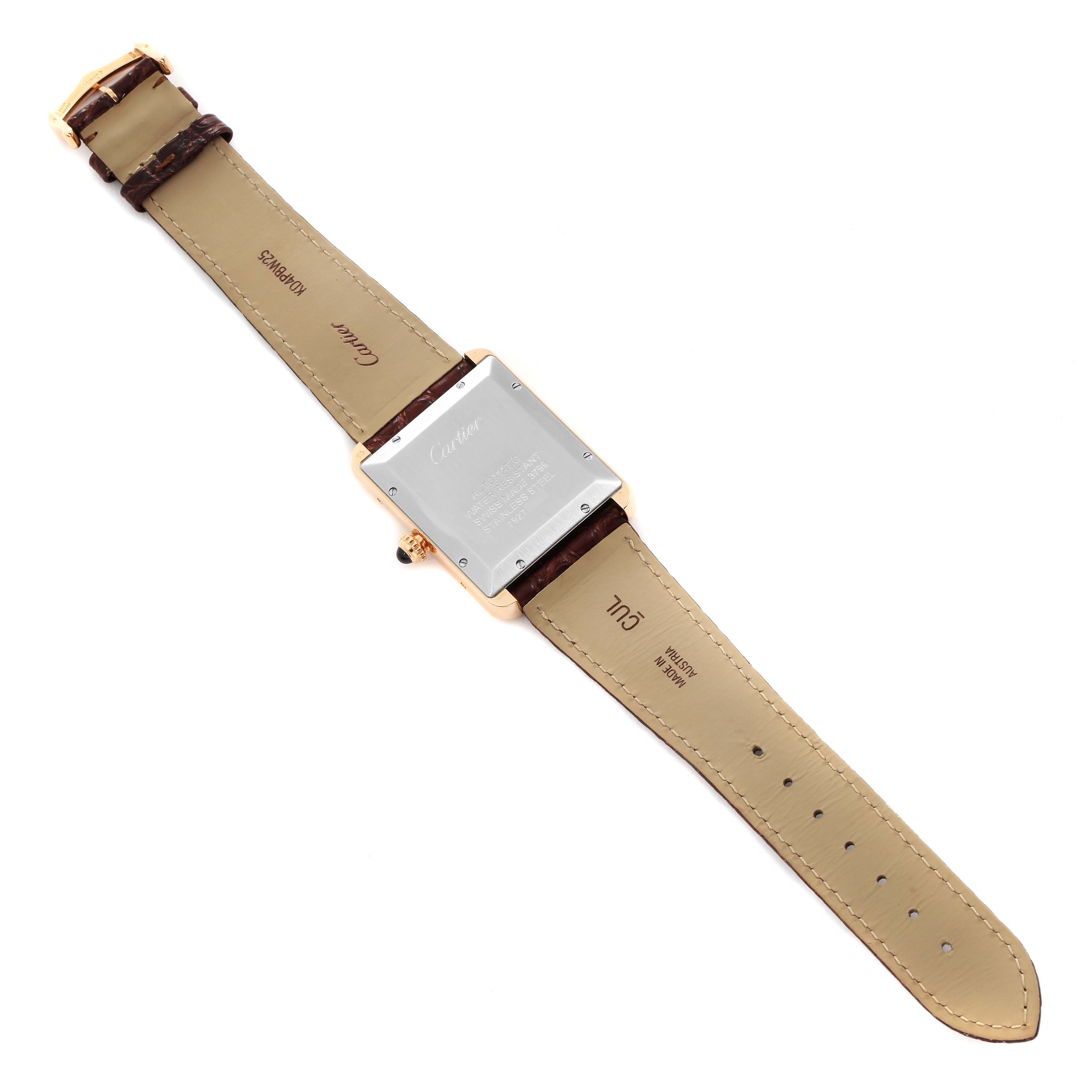 The image shows the back view of a Tank Solo model by Cartier, displaying the case back and straps.