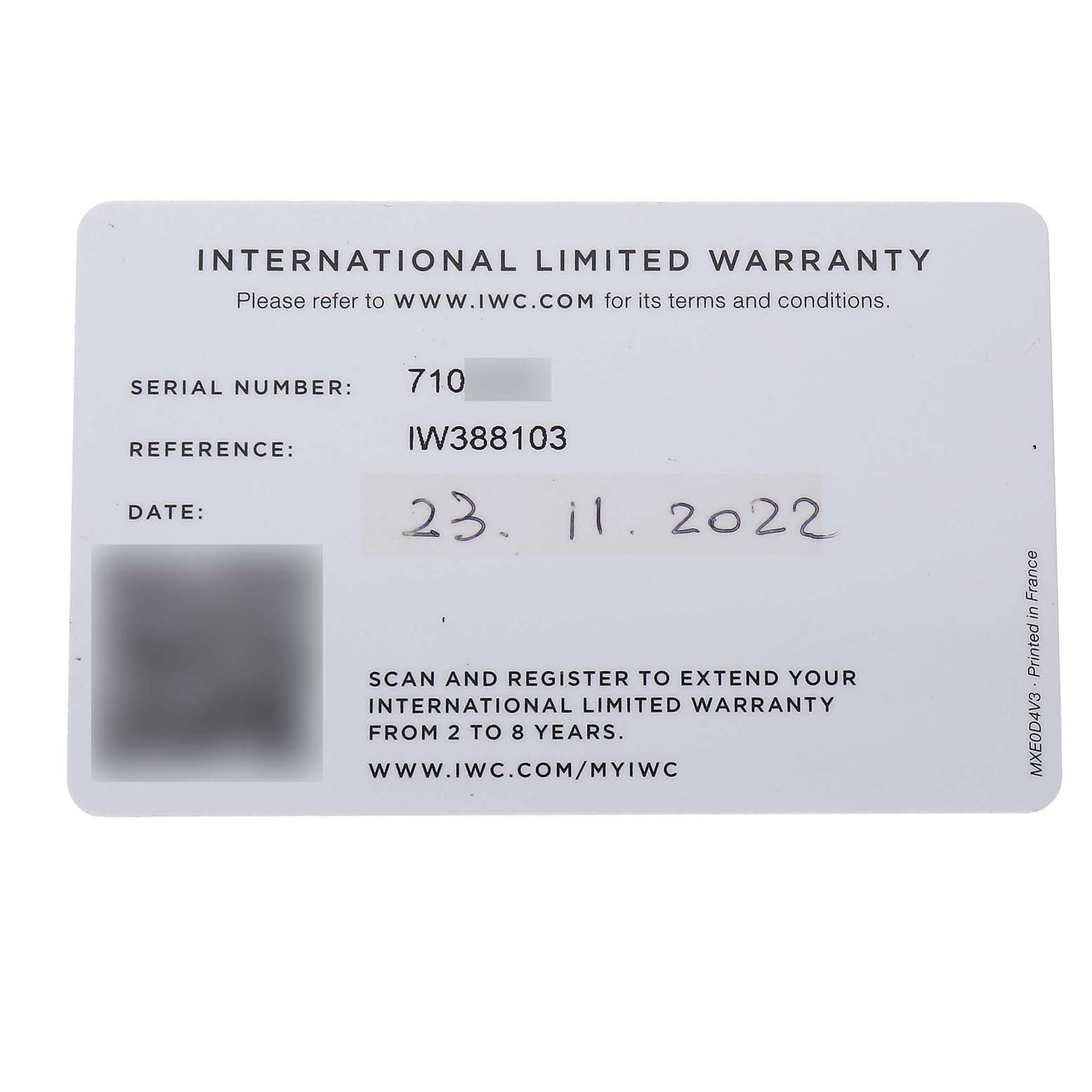 The image shows an International Limited Warranty card for the IWC Pilot IW388103 Men's Stainless Steel Green Dial model watch.