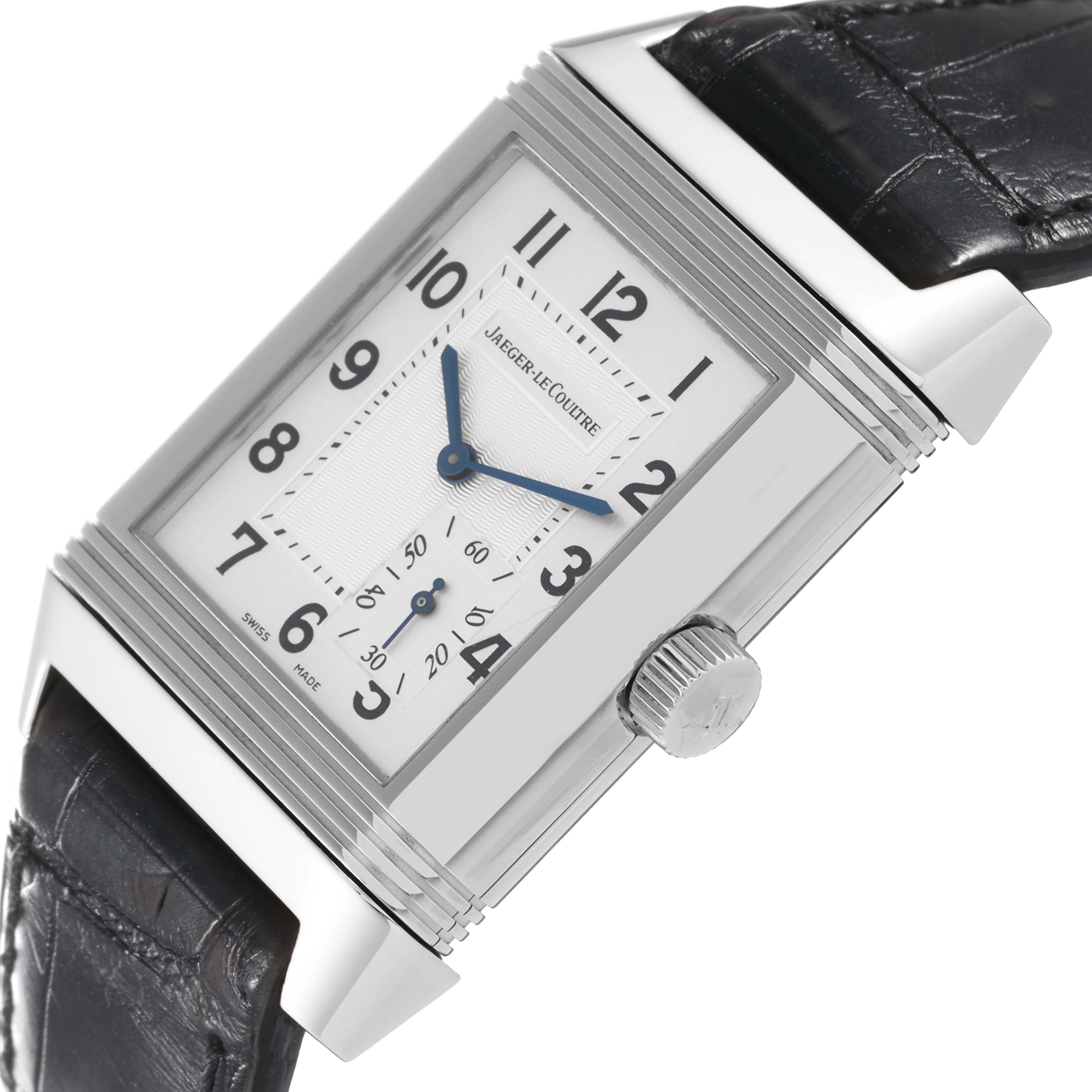 The Jaeger LeCoultre Reverso Q3018420 Men's Stainless Steel Silver Dial Q3018420 Men's Stainless Steel Silver Dial watch is shown at an angled view, displaying its face, crown, and part of its leather strap.