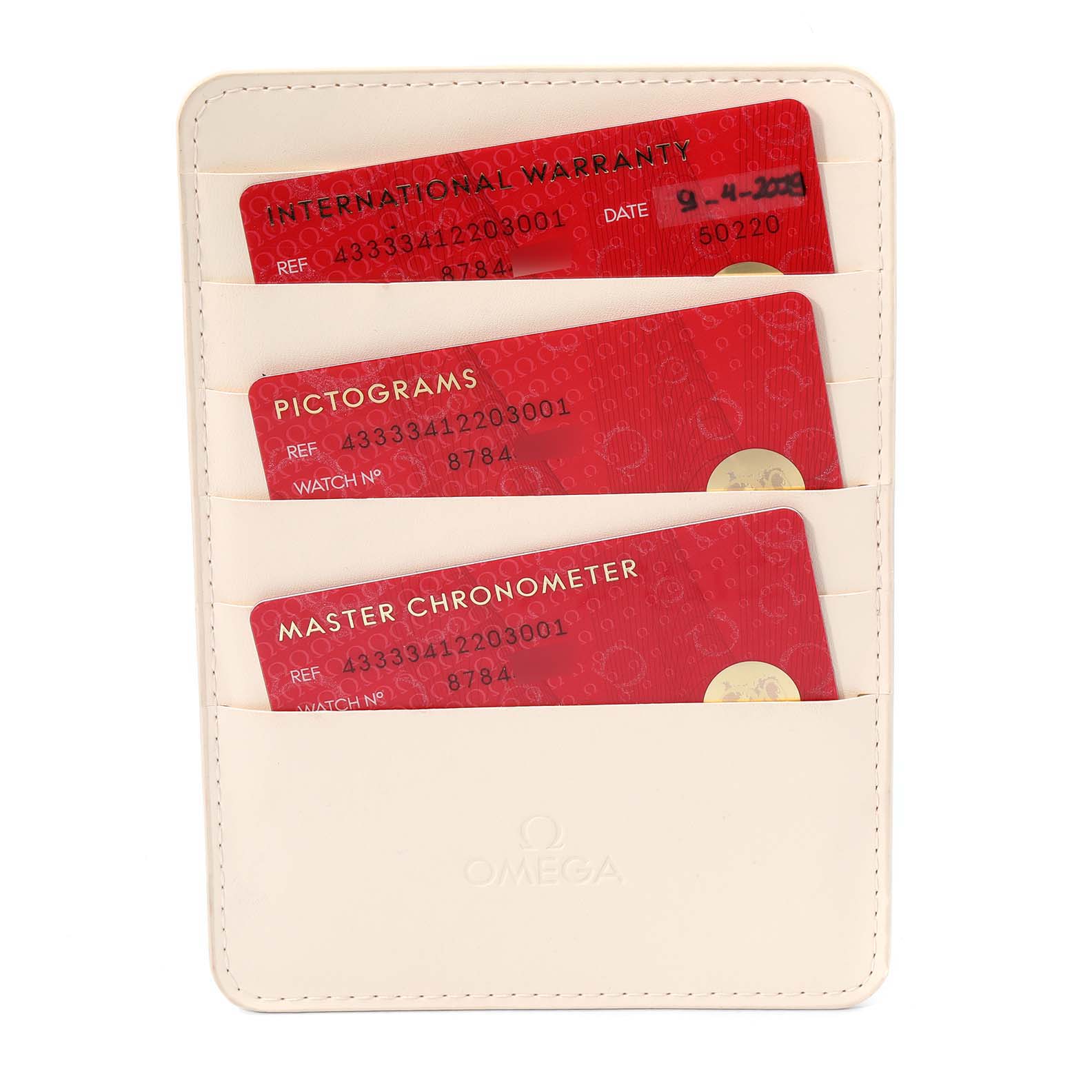 The image shows the warranty, pictograms, and Master Chronometer cards for the Omega De Ville 433.33.41.22.03.001 Men's Stainless Steel Blue Dial 433.33.41.22.03.001 Men's Stainless Steel Blue Dial watch.