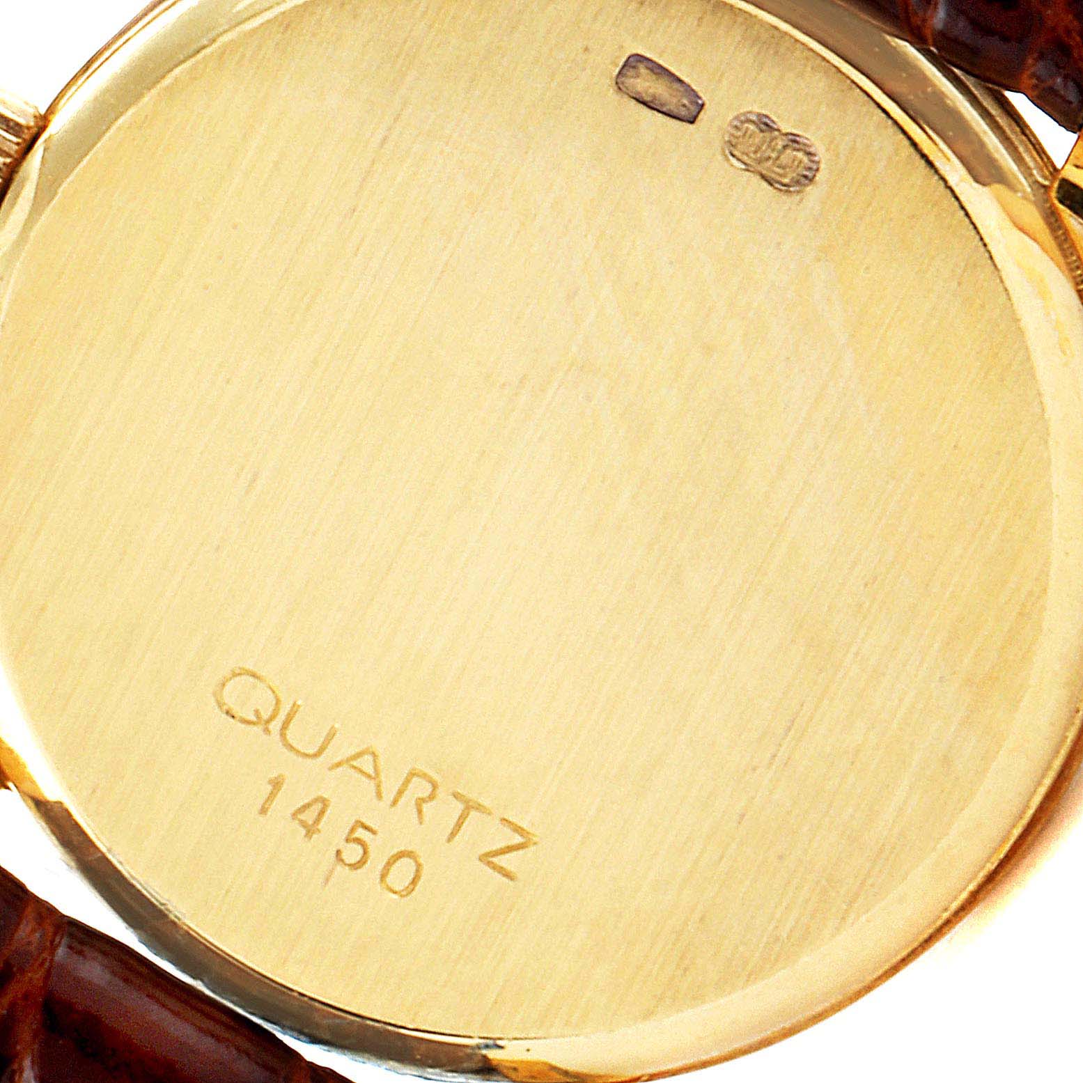 The image shows the back case of an Omega 1450 Women
s Yellow Gold Champagne Dial 1450 Women
s Yellow Gold Champagne Dial DeVille Mini Yellow Gold Diamond Cocktail Ladies Watch 1450, featuring the engraved model number.