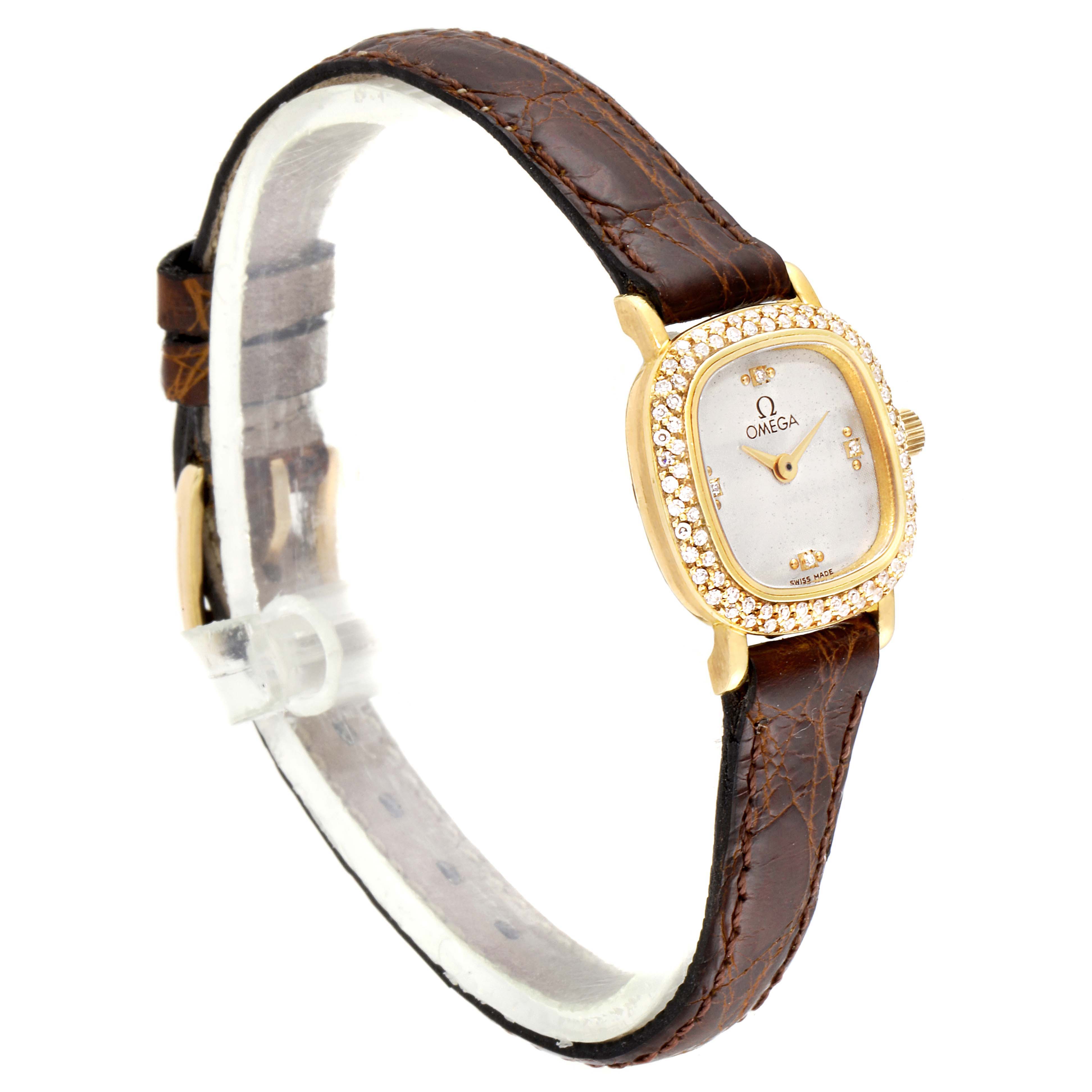 The image shows an angled view of the Omega 1450 Women's Yellow Gold Silver Dial 1450 Women's Yellow Gold Silver Dial DeVille Mini Yellow Gold Diamond Cocktail Ladies Watch 1450, highlighting the dial, bezel, and strap.