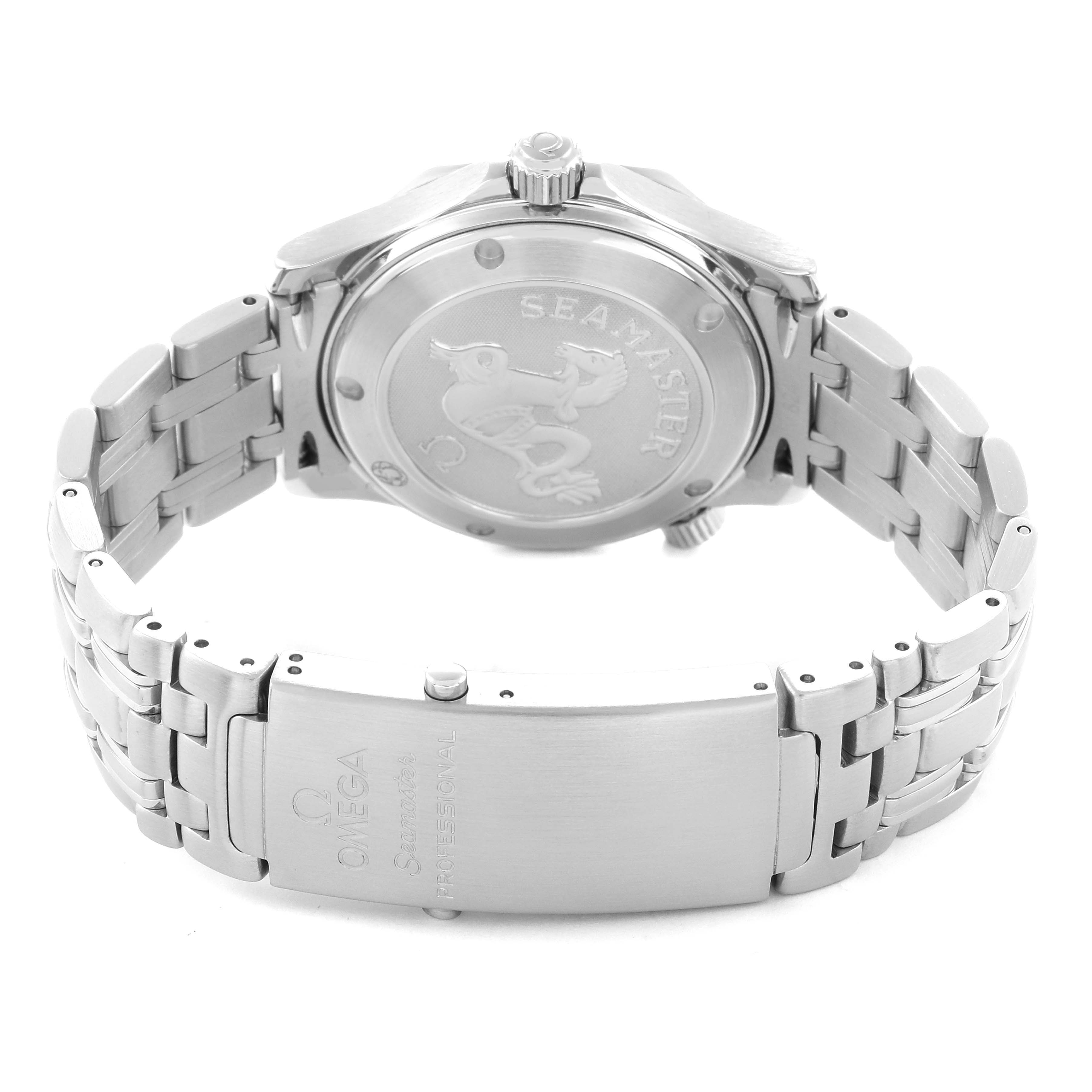 The image shows the back and clasp of the Omega Seamaster model 2223.80.00, highlighting the case back engraving and the bracelet's details.