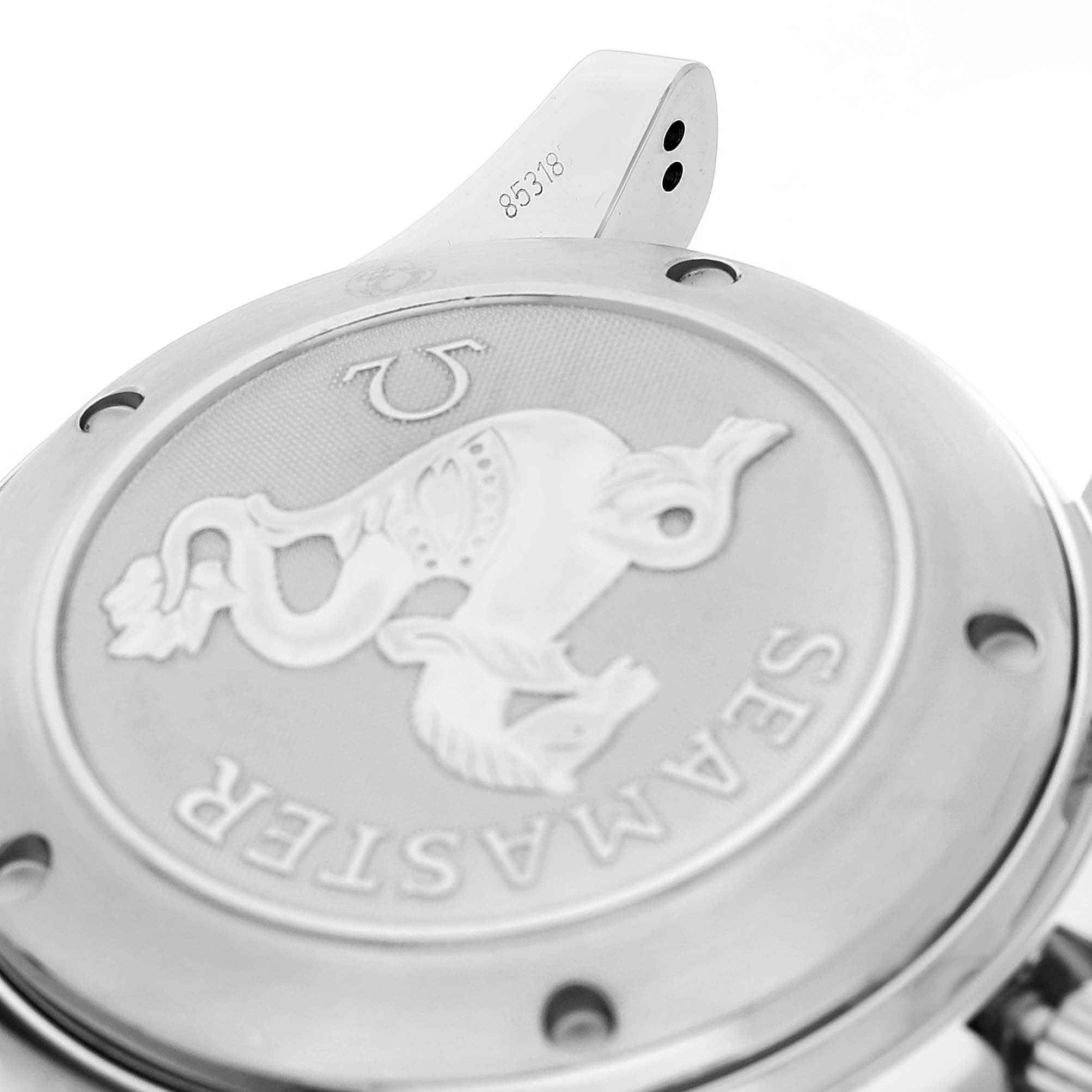 The image shows the case back of an Omega Seamaster 2225.80.00 Men's Stainless Steel Blue Dial, highlighting its embossed logo and serial number area.