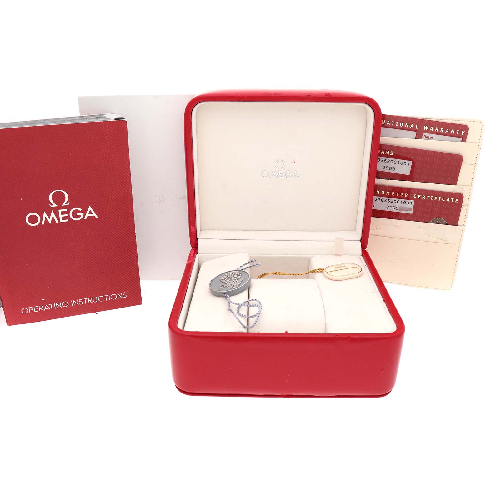 The image shows an Omega Seamaster 212.30.36.20.01.001 Men's Stainless Steel Black Dial watch box, operating instructions, warranty cards, and hang tags from a frontal angle.