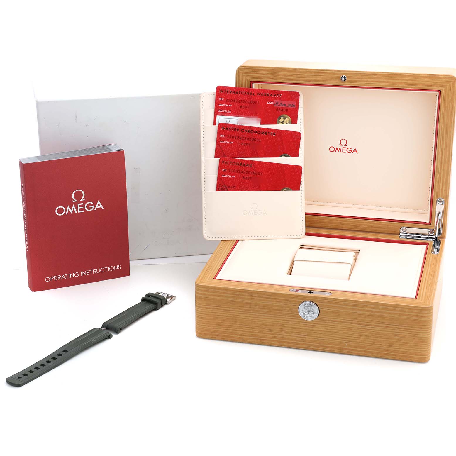 The image shows the Omega Seamaster 210.32.42.20.10.001 Men's Stainless Steel Green Dial watch box, red instruction manual, cards, and a black strap.
