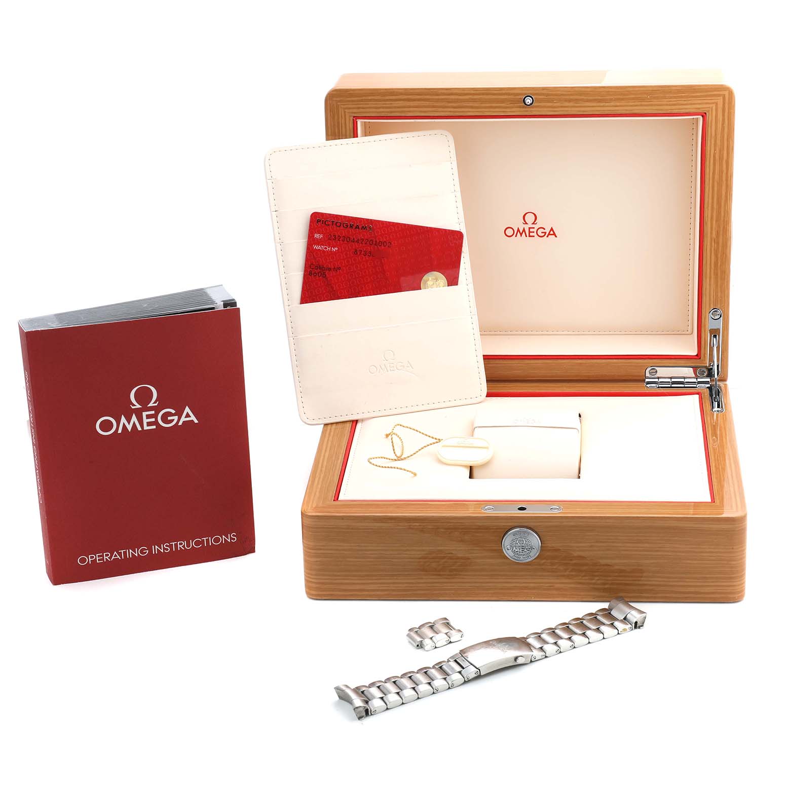 The image shows an Omega Planet Ocean 232.30.44.22.01.002 Men's Stainless Steel Black Dial watch box with instructions, warranty card, and a metal bracelet on display.
