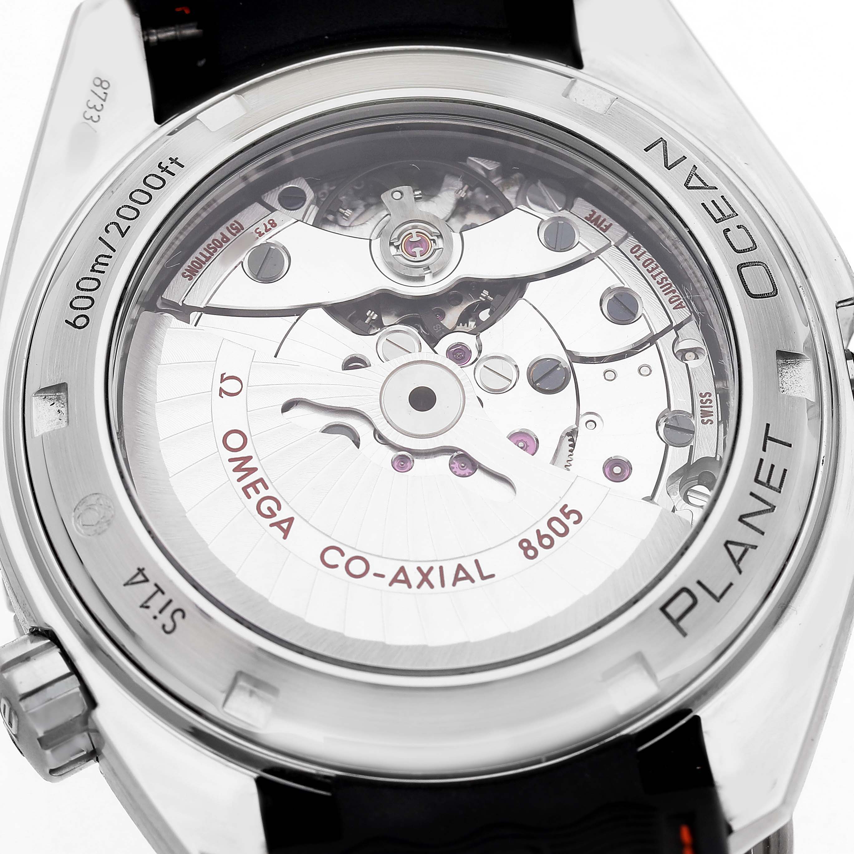 The image shows the case back of the Omega Planet Ocean 232.30.44.22.01.002 Men's Stainless Steel Black Dial, revealing its co-axial movement.