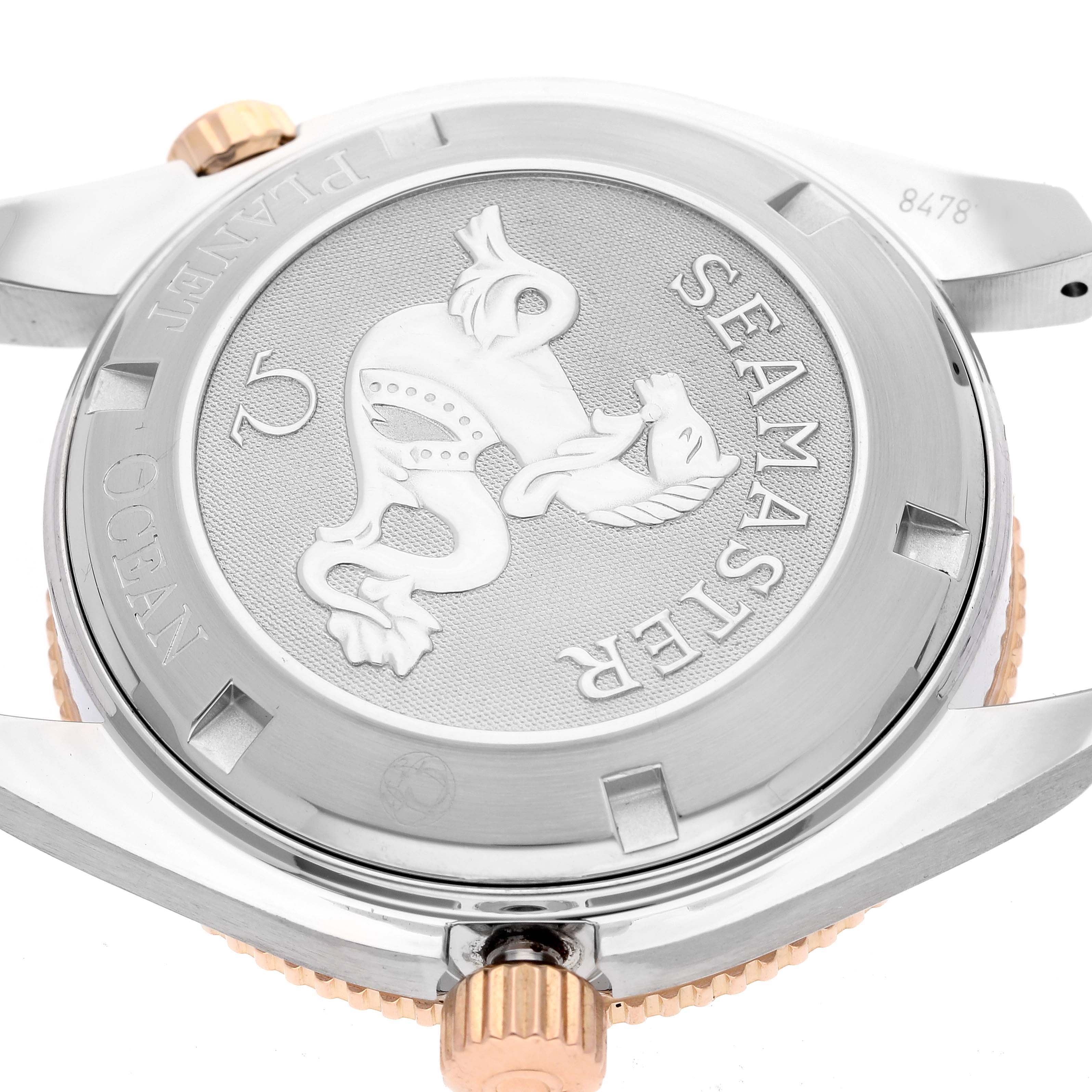 The image shows the case back, lugs, and crown of the Omega Planet Ocean 222.28.42.20.04.001 Men's Steel and Gold (two tone) White Dial 222.28.42.20.04.001 Men's Steel and Gold (two tone) White Dial watch, highlighting the "Seamaster" engraving.