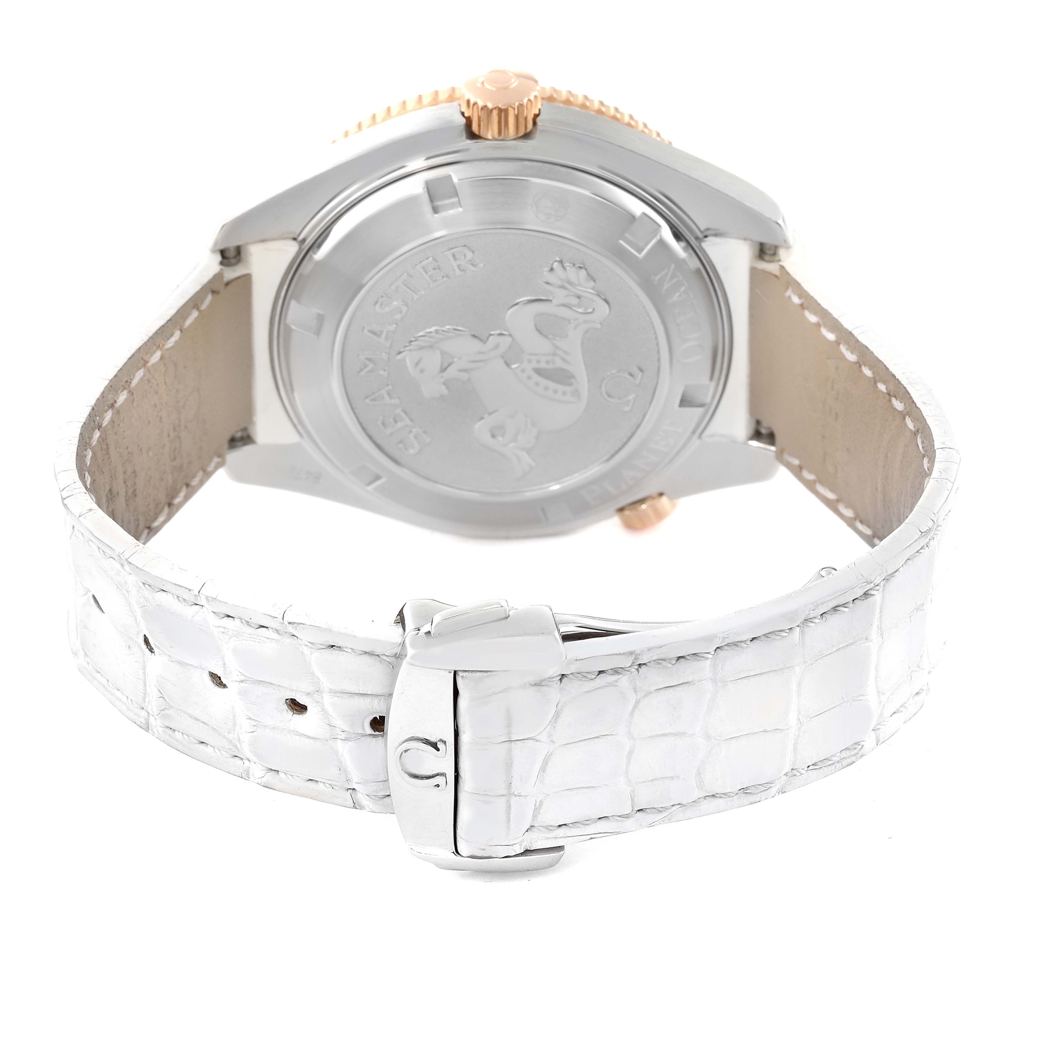 The image shows the back case and white leather strap of the Omega Planet Ocean 222.28.42.20.04.001 Men's Steel and Gold (two tone) White Dial 222.28.42.20.04.001 Men's Steel and Gold (two tone) White Dial watch, highlighting the seamaster engraving.