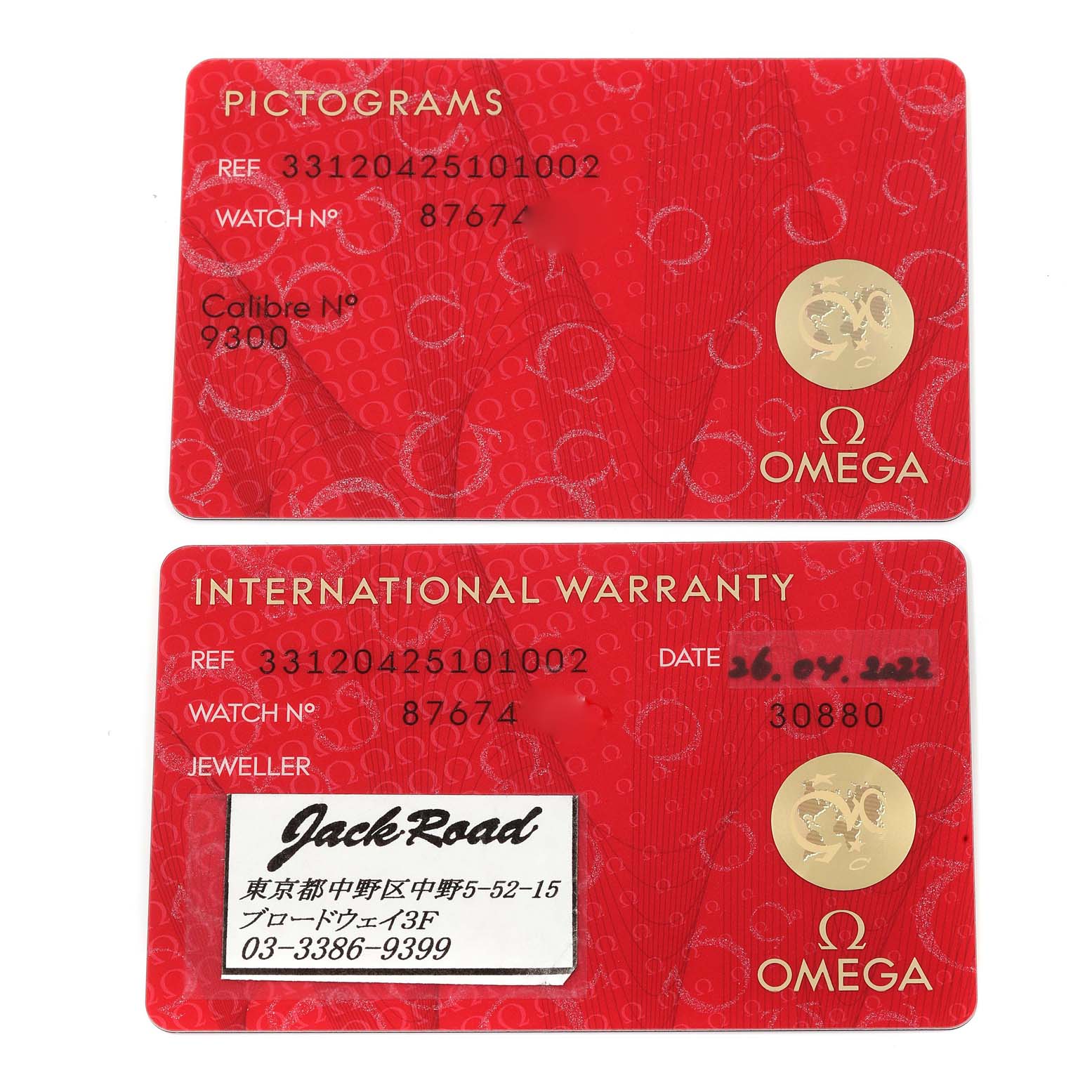 The image shows the front of two red Omega Speedmaster 331.20.42.51.01.002 Men's Steel and Gold (two tone) Black Dial 331.20.42.51.01.002 Men's Steel and Gold (two tone) Black Dial cards: a Pictograms card and an International Warranty card.