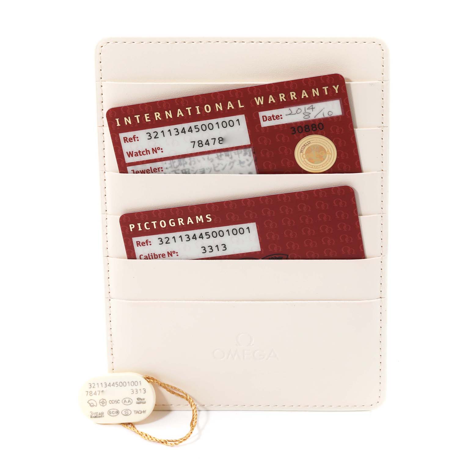 The image shows warranty cards and an ID tag for an Omega Speedmaster 321.13.44.50.01.001 Men
s Stainless Steel Black Dial 321.13.44.50.01.001 Men
s Stainless Steel Black Dial watch, neatly placed in a white cardholder.